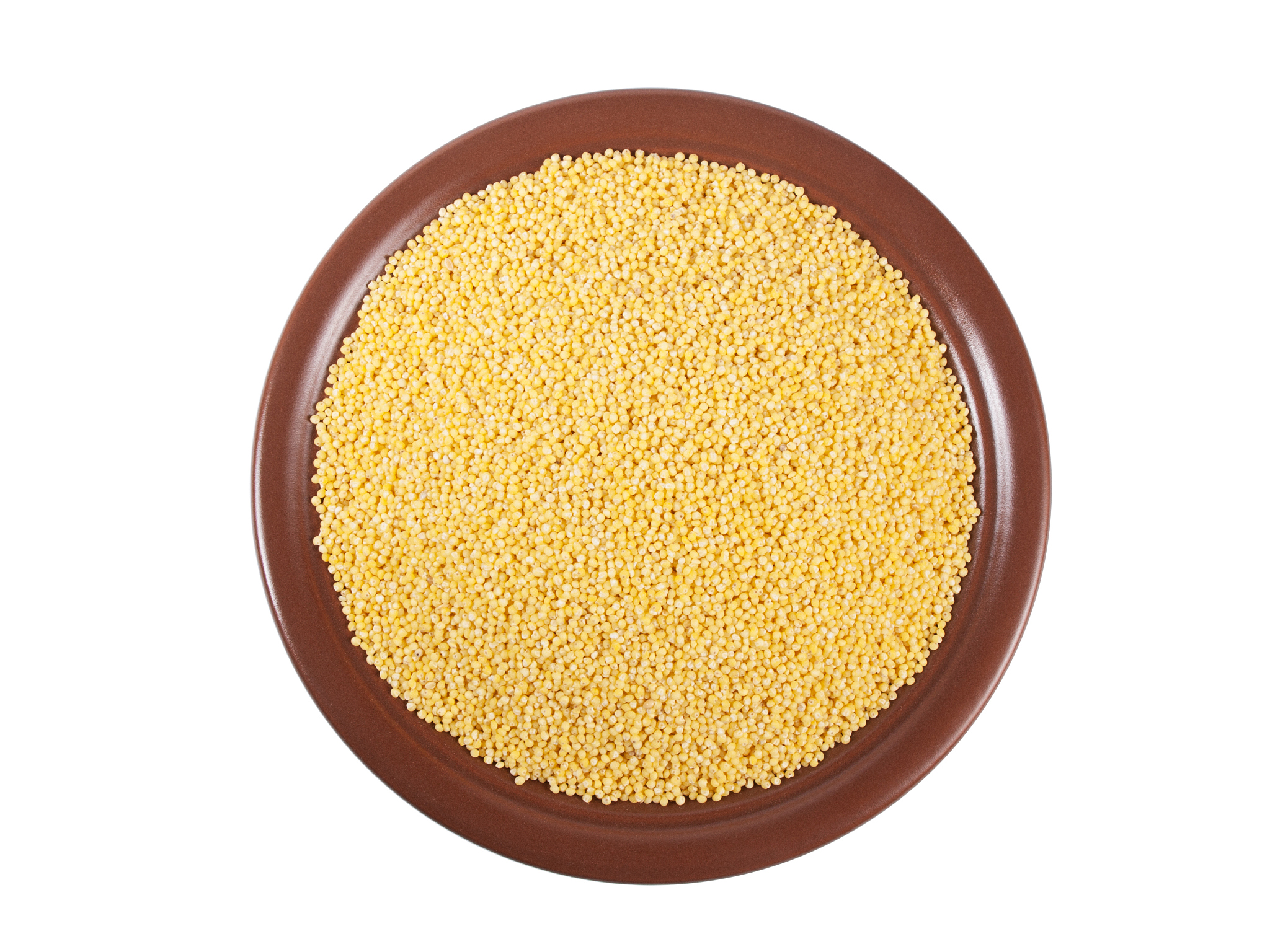 millet heap on plate top view