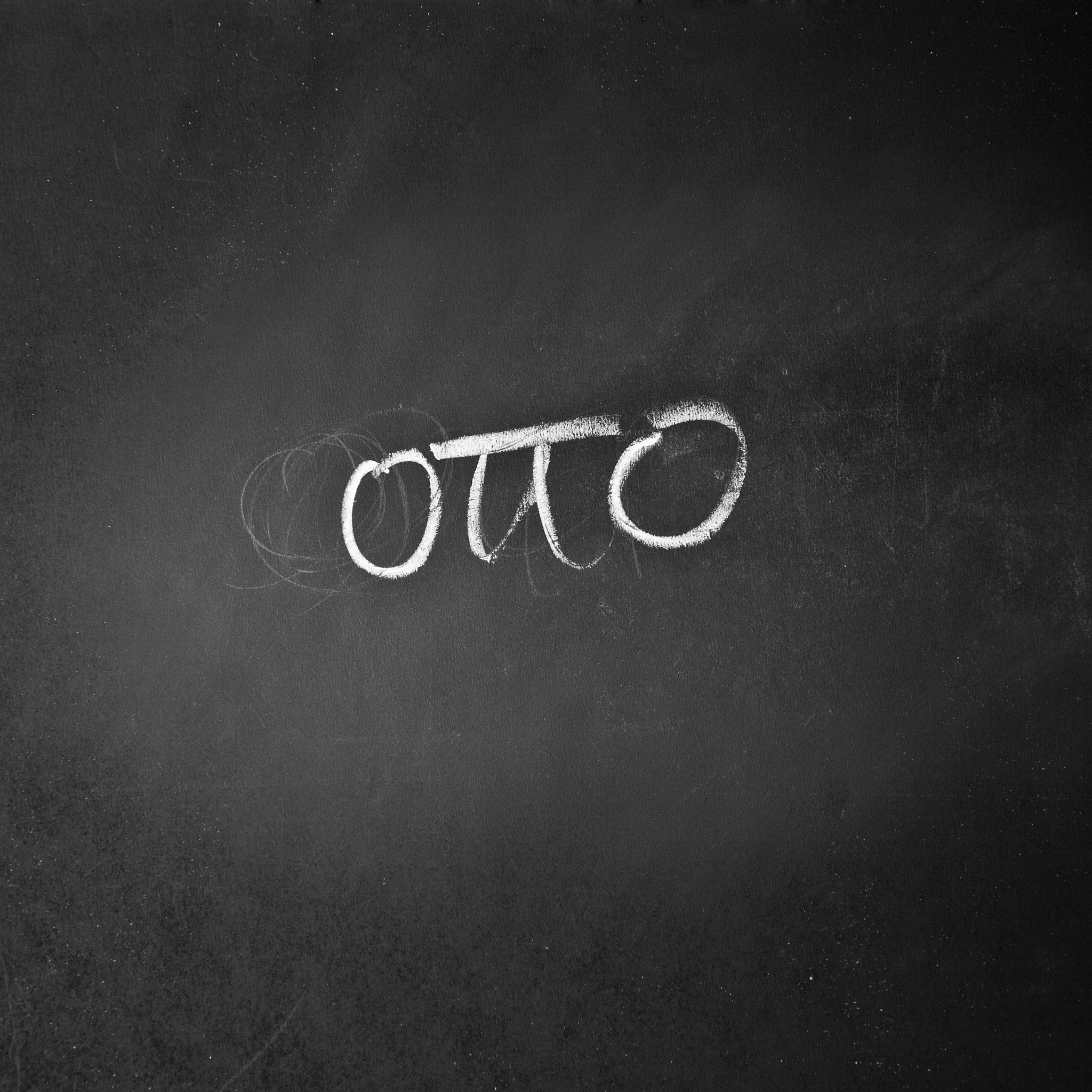 glyph of the italian number eight written on a blackboard