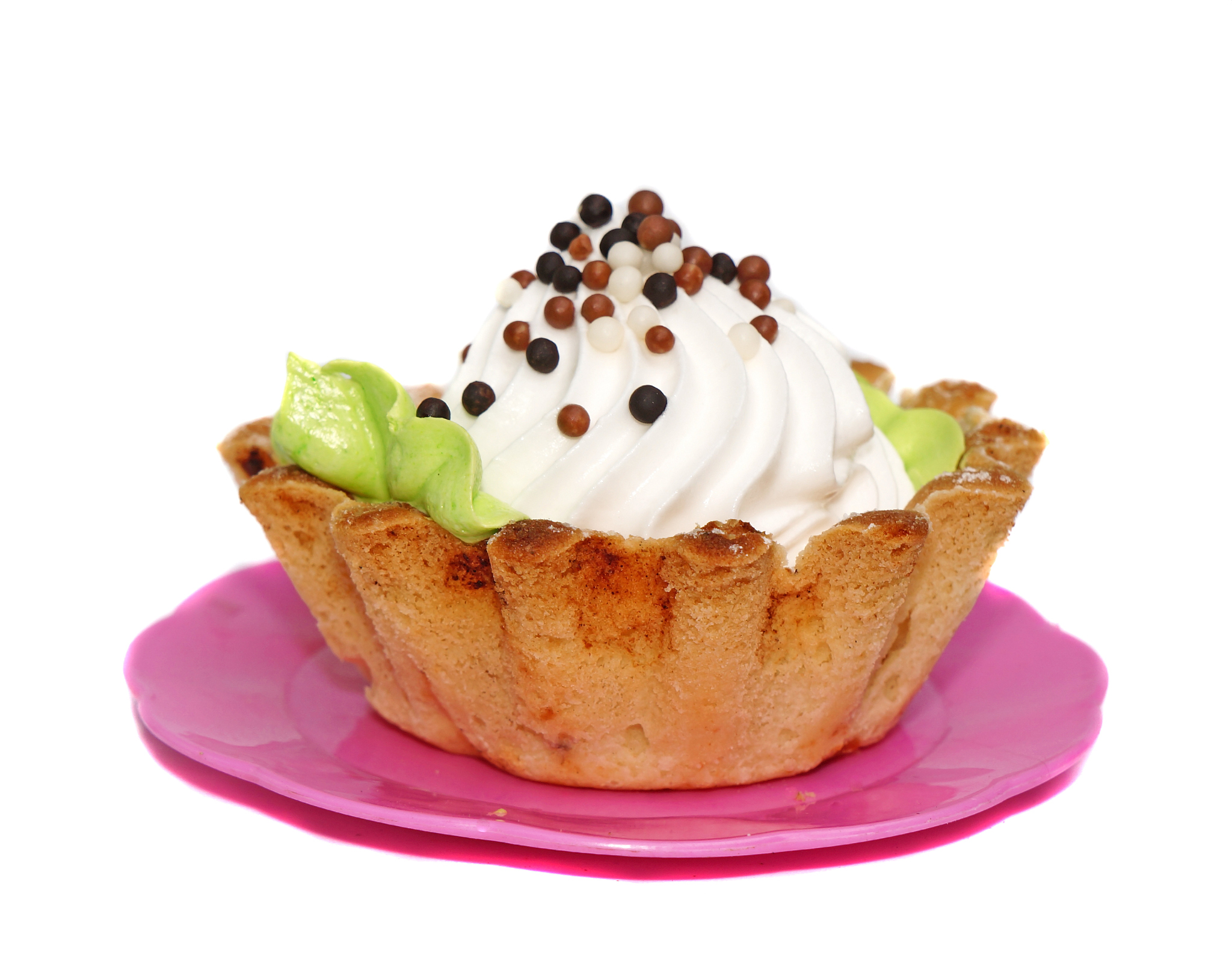 cake basket with white cream decorated with small balls