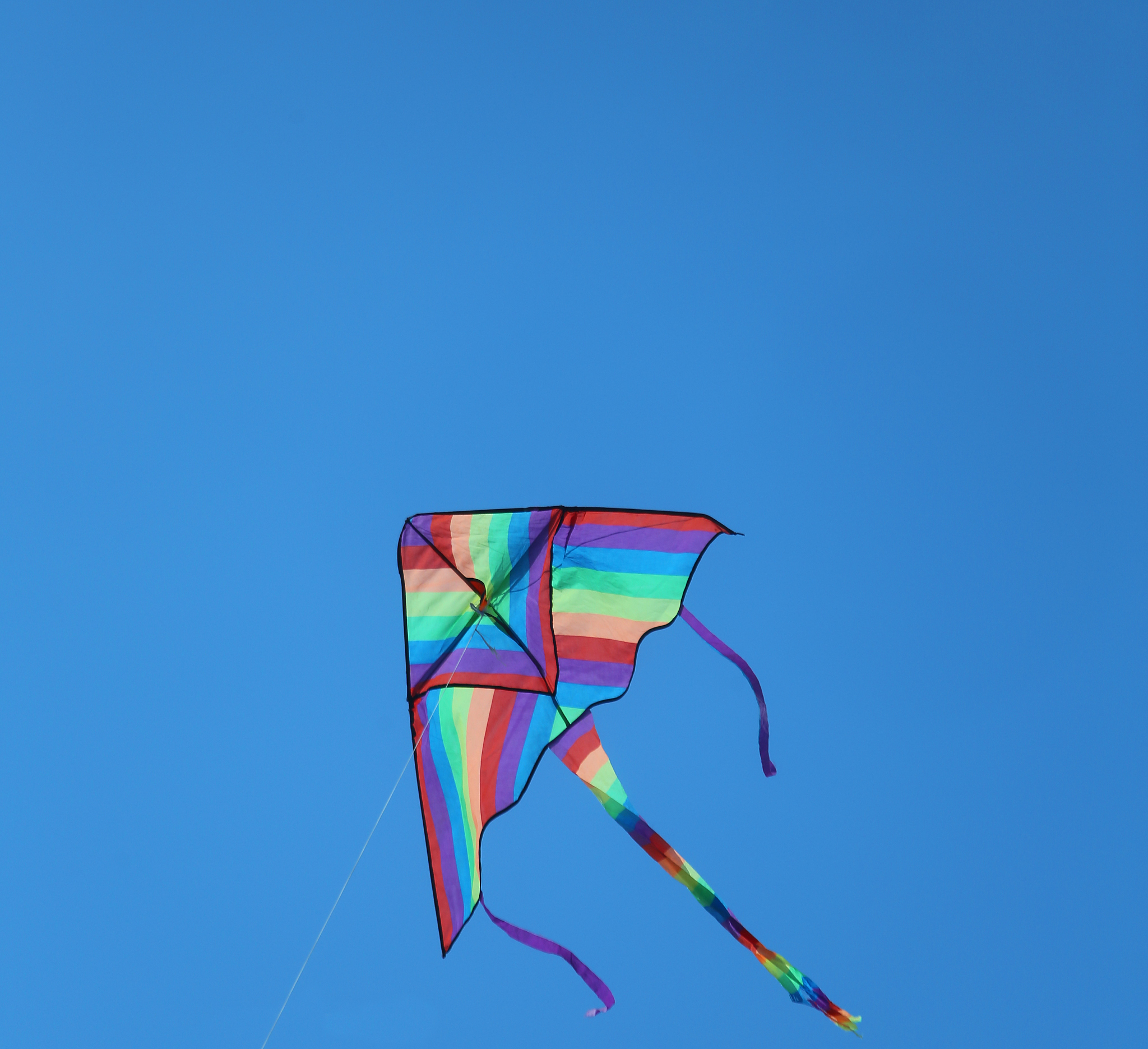 kite in sky blue for the amusement of children
