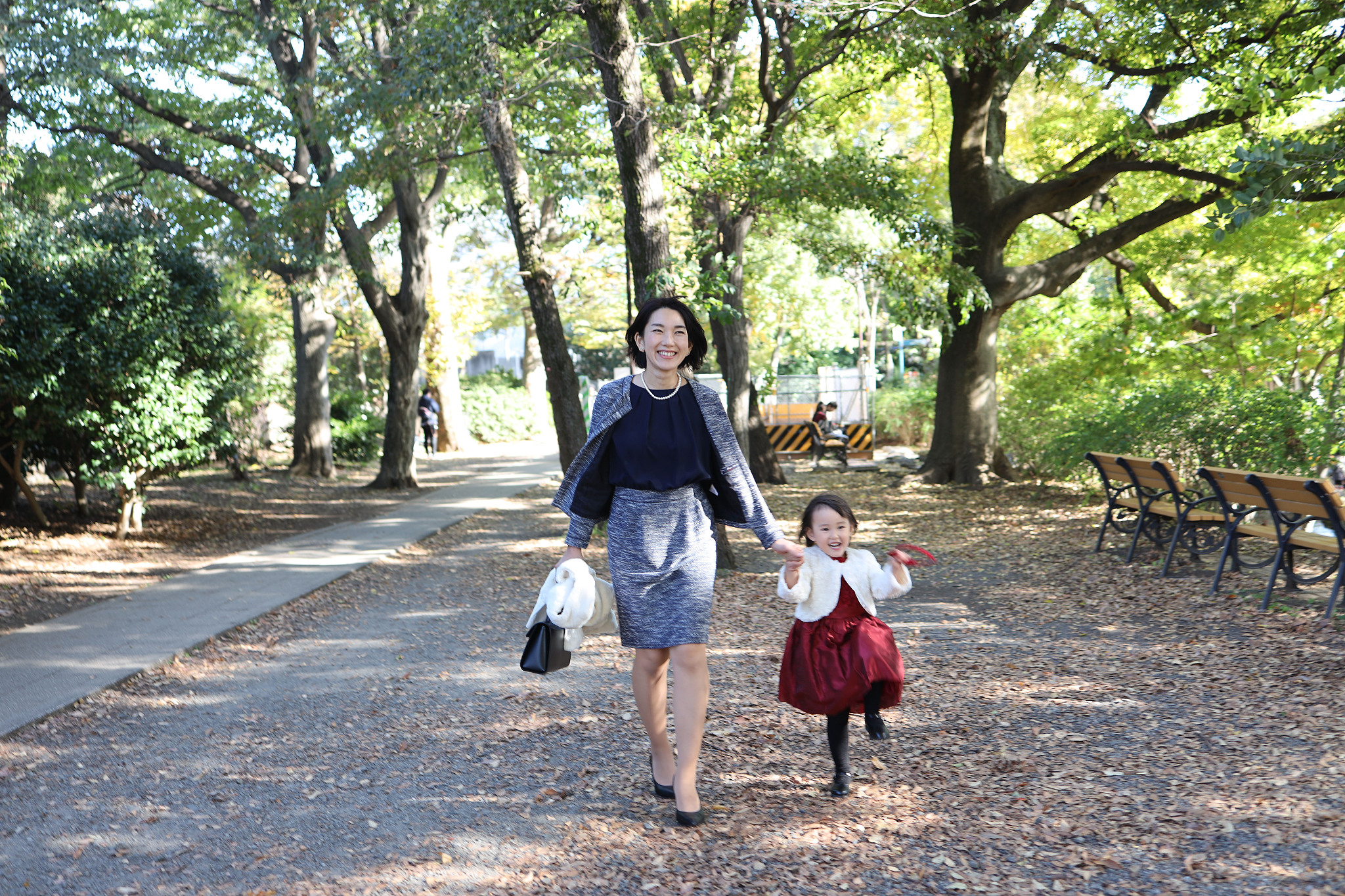 japanese mother walking  with her daughter at shichi go san cele