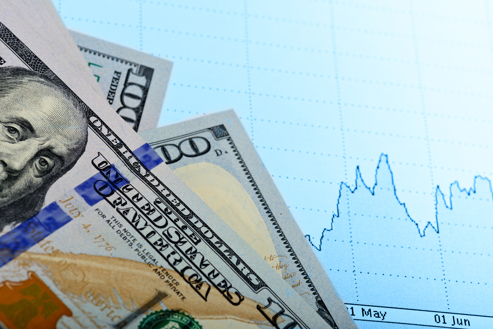 banknotes  and financial charts