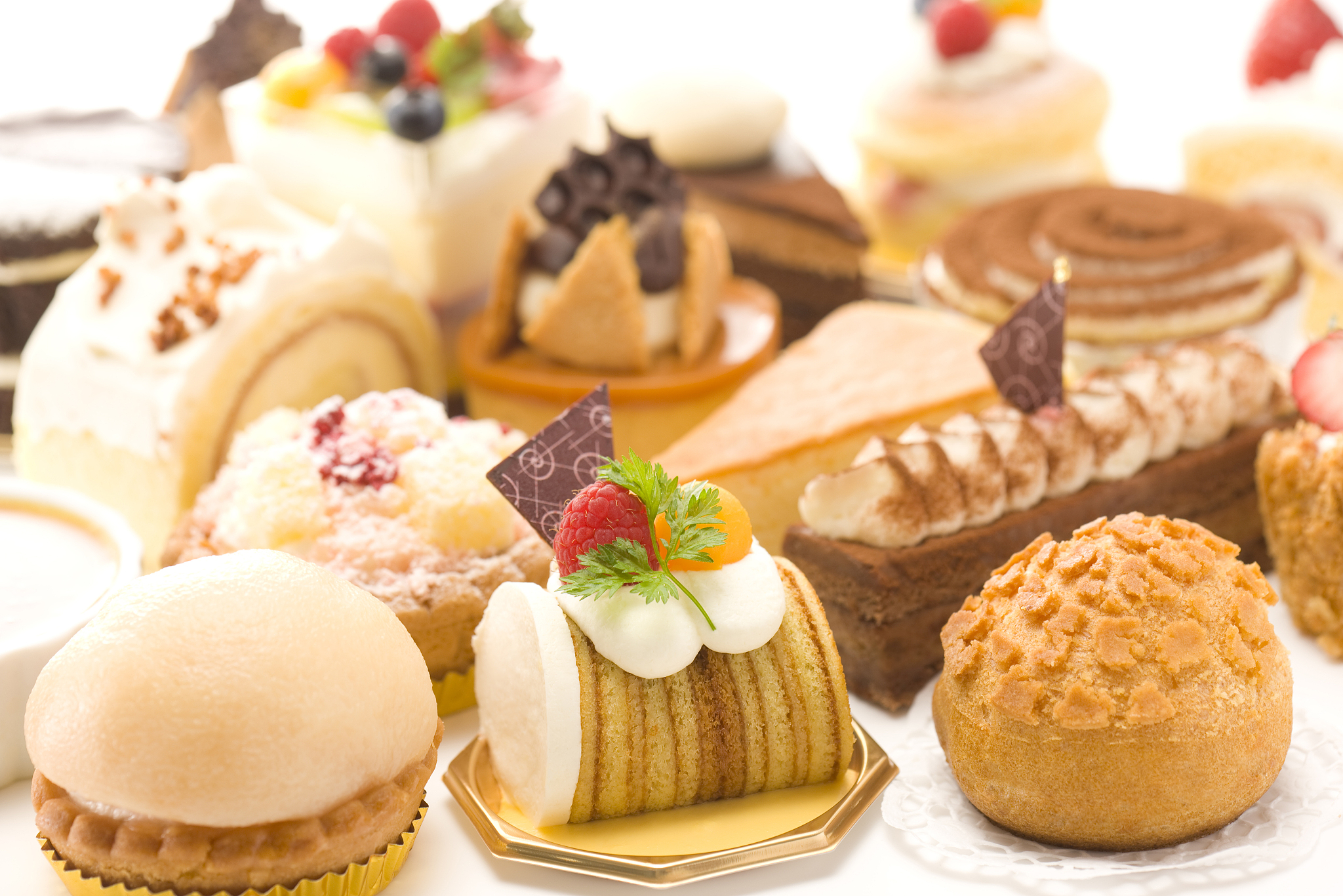 a selection of cakes and pastries