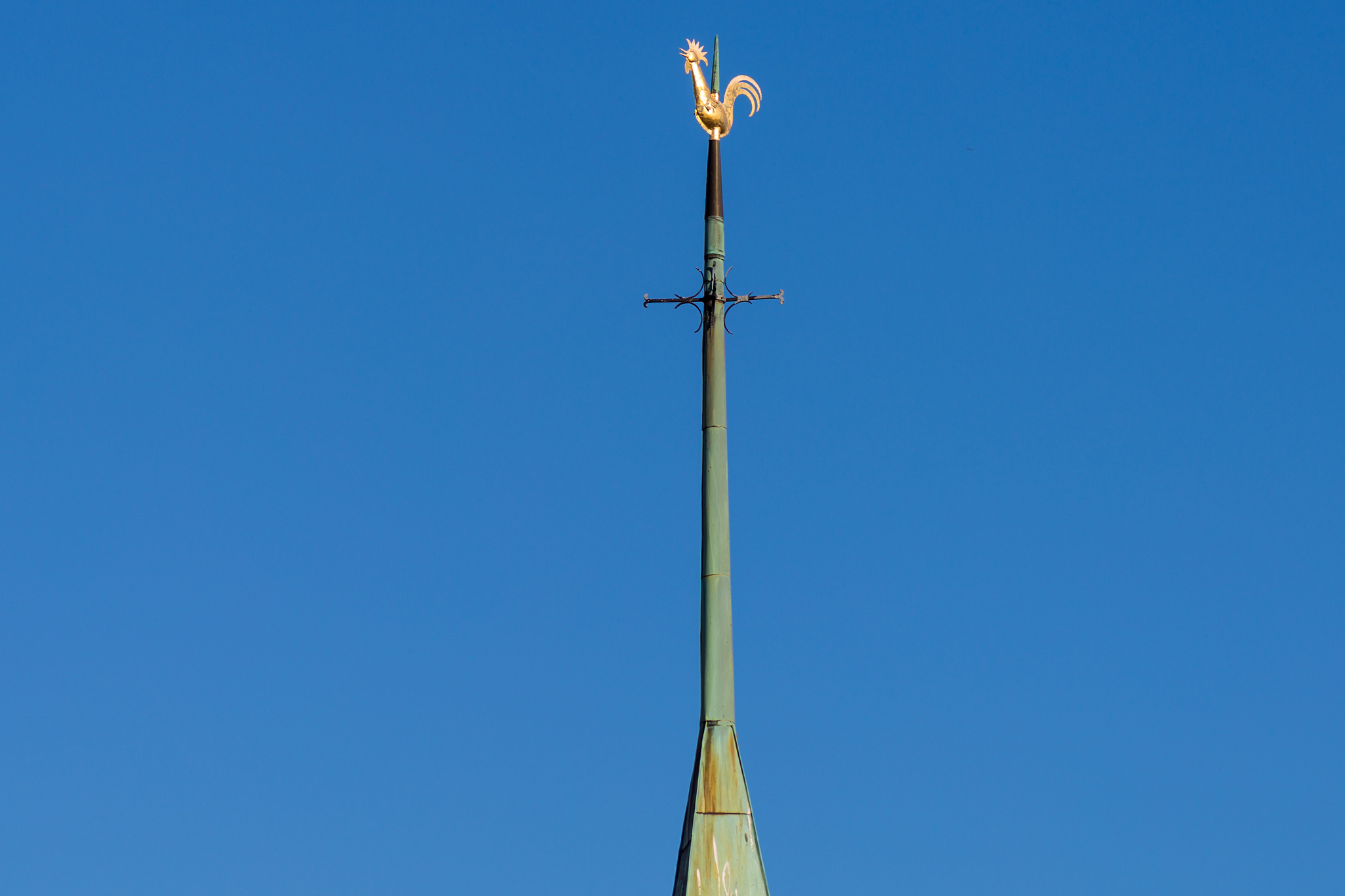 steeple weathercock on summer sunny day