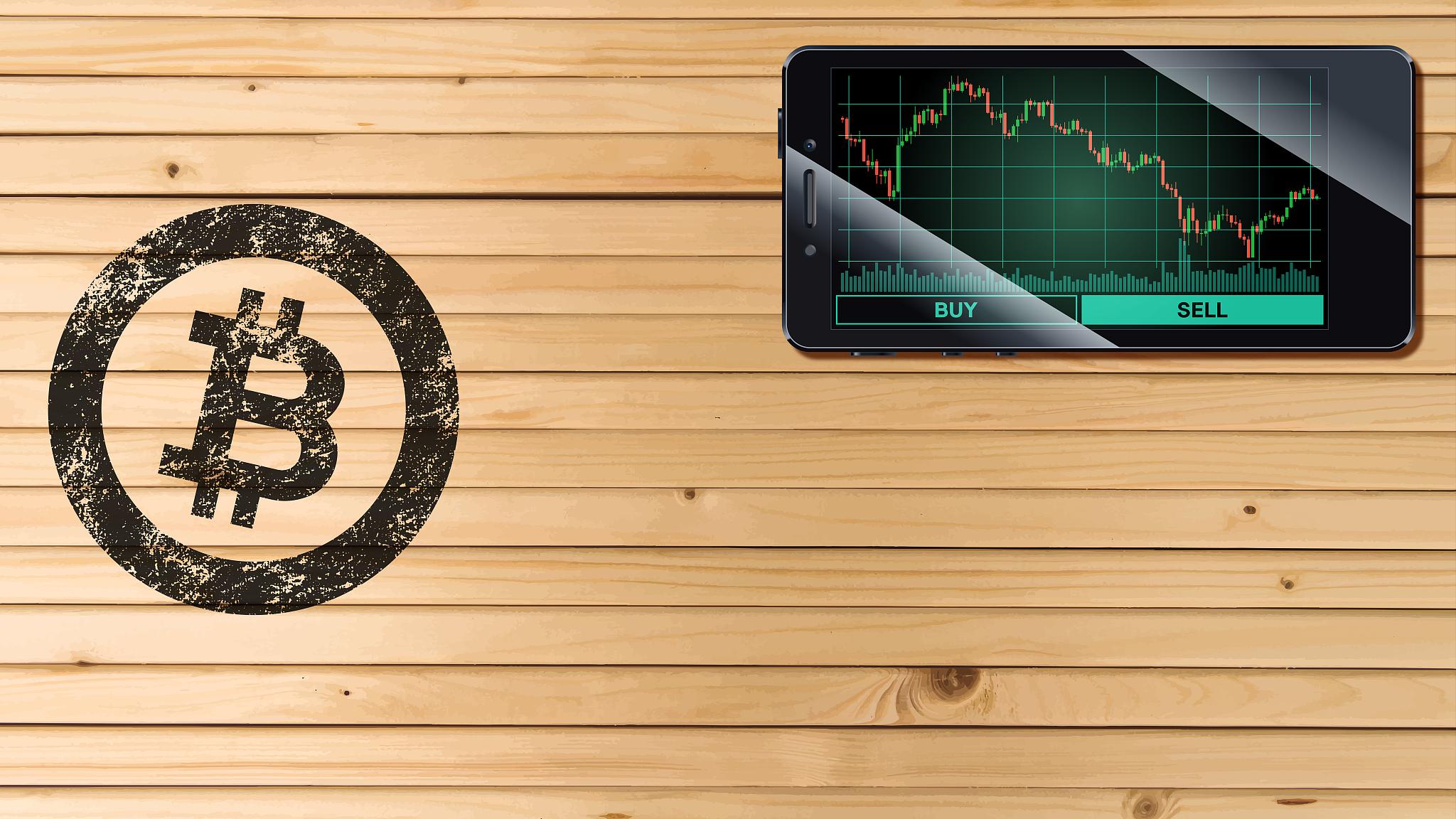 cryptocurrency concept [a smartphone with bitcoin chart displaye