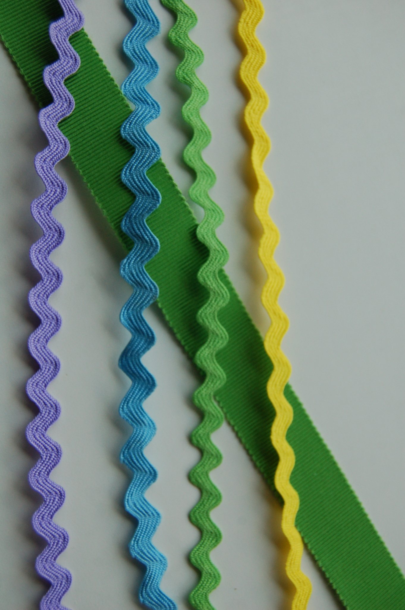 fabric ric rac trim in pastel colors with green ribbon