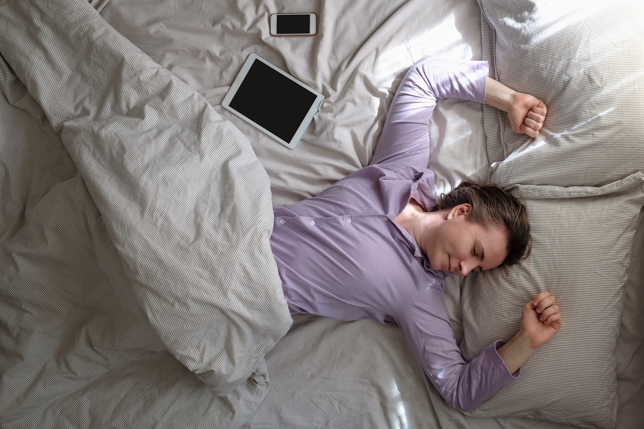 young beautiful woman sleeping on the bed