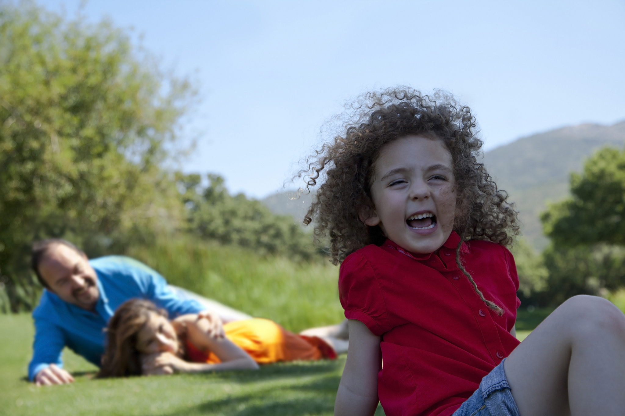 picture of a happy family at the park