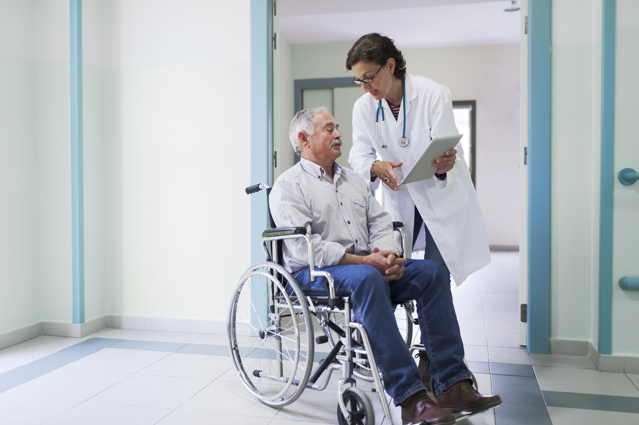 doctor helping a patient