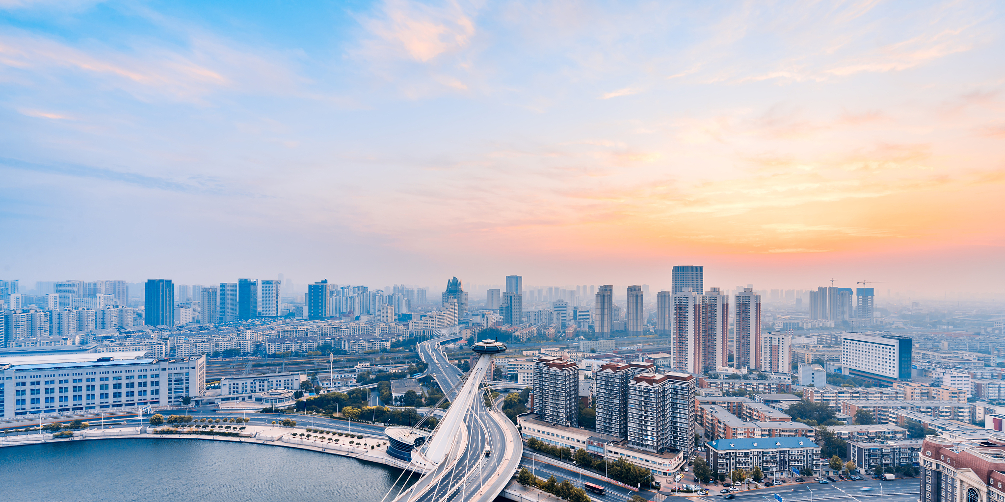 中国天津赤峰大桥清晨彩霞城市风光