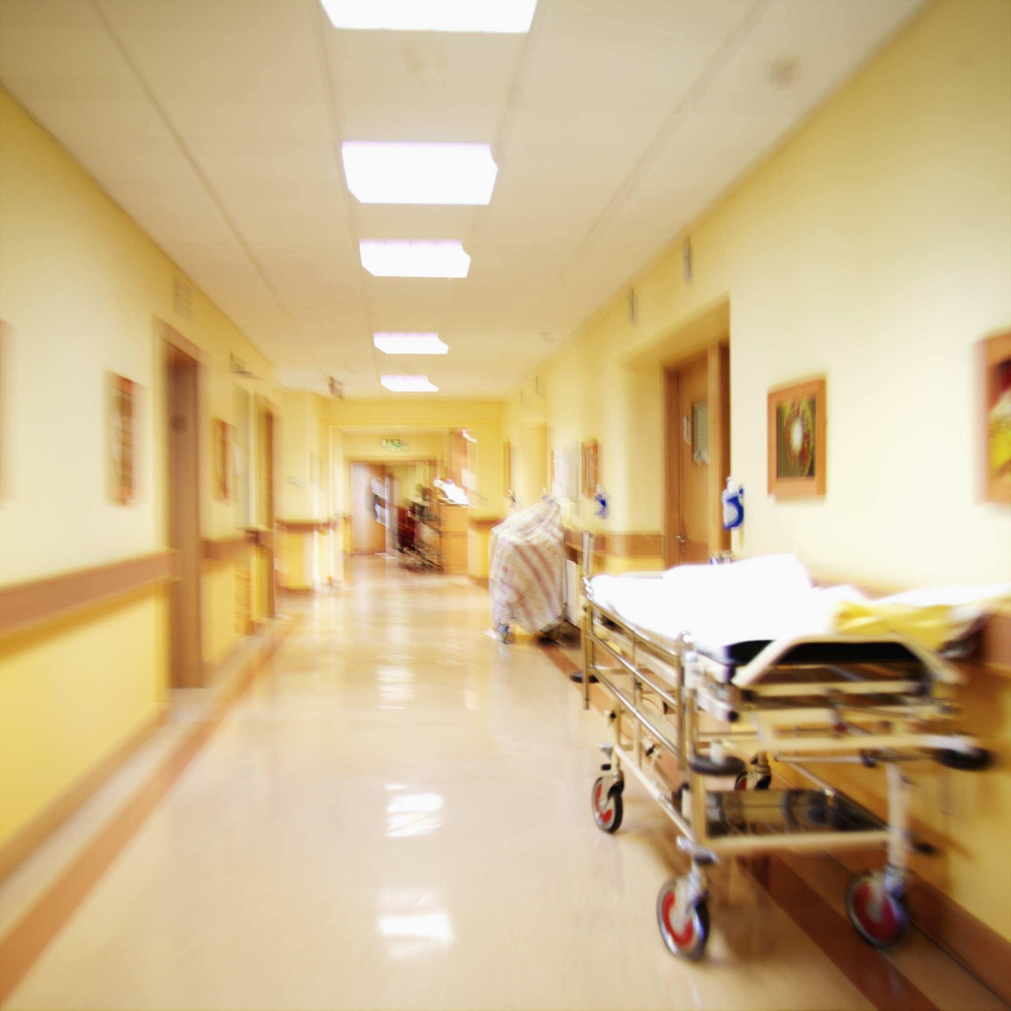 blurred view of a hospital corridor