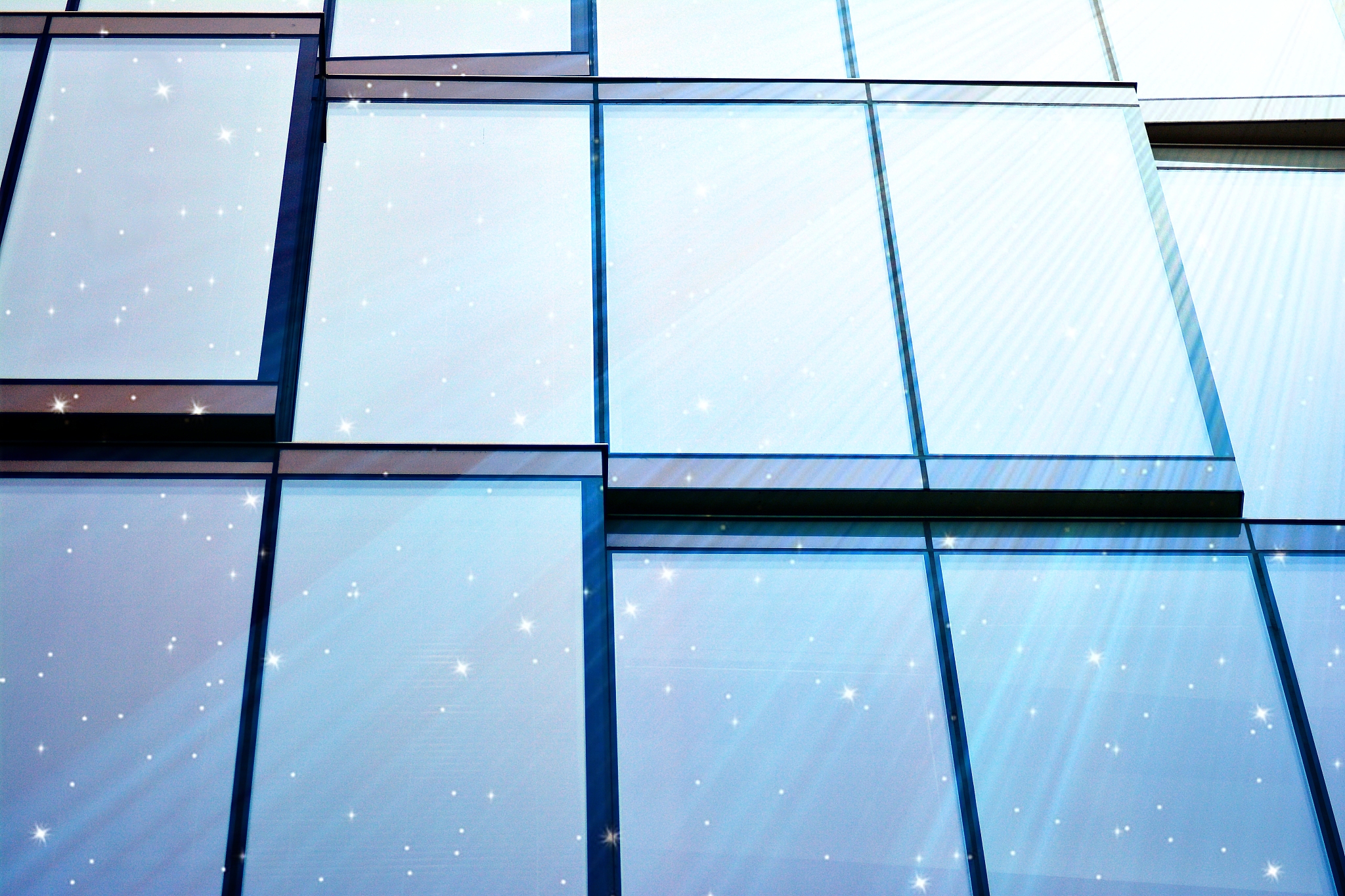 sky with the stars above a office building.