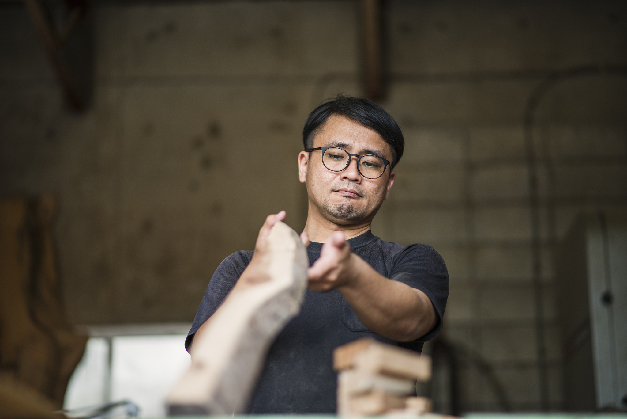 male craftsperson working in studio
