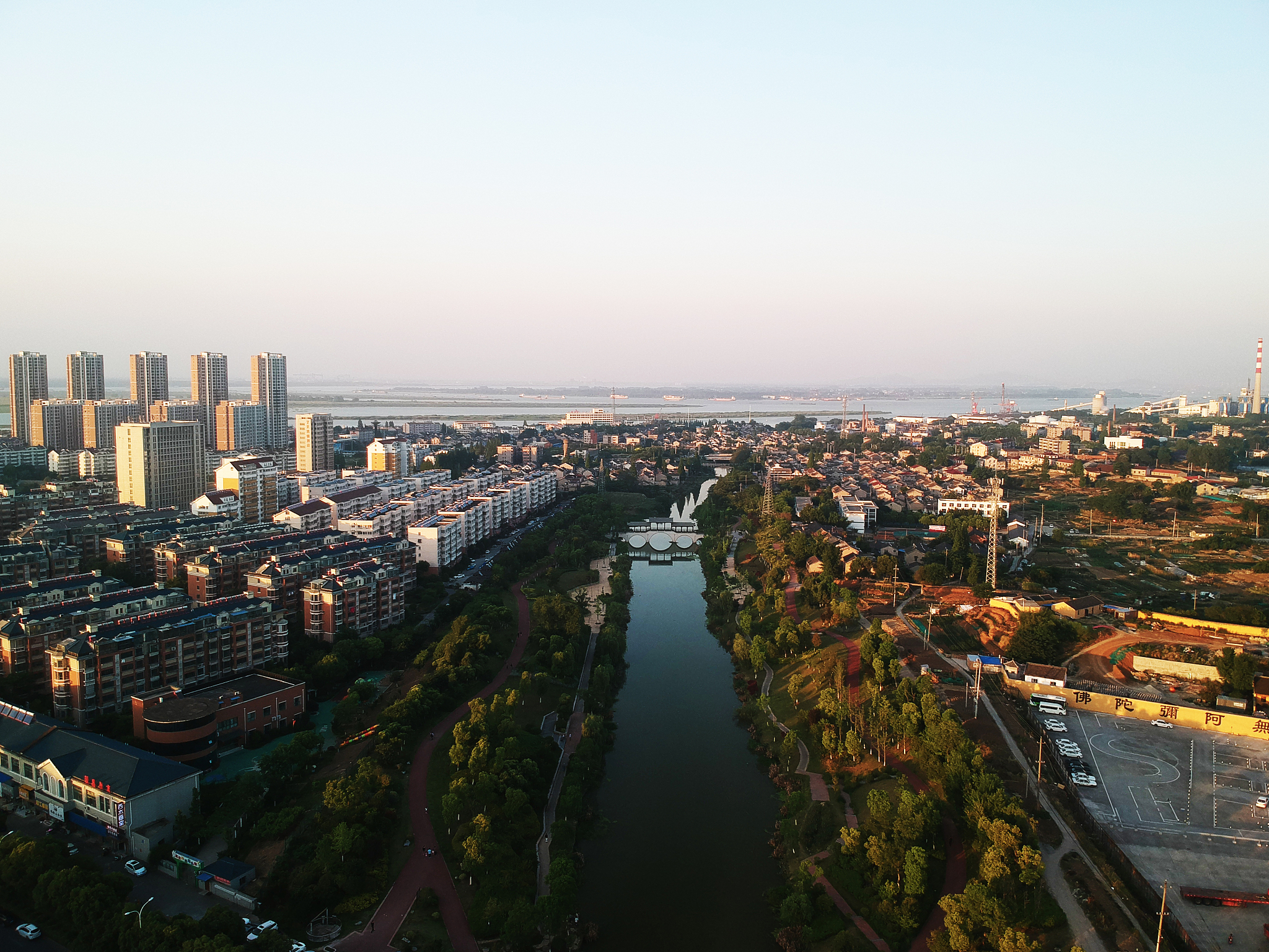 high angle view of buildings in city against clear sky
