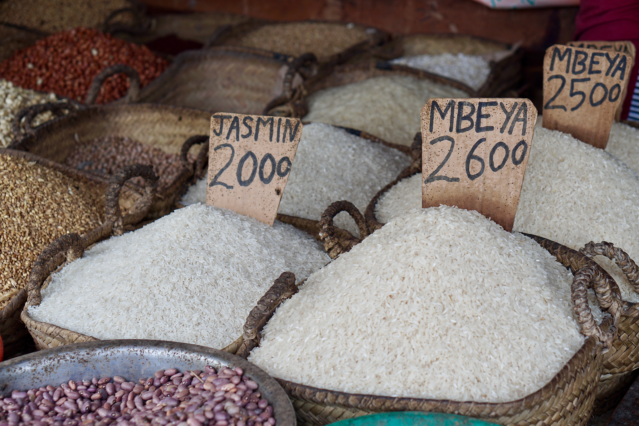 rice and spices for sale at local market in stone town, zanzibar