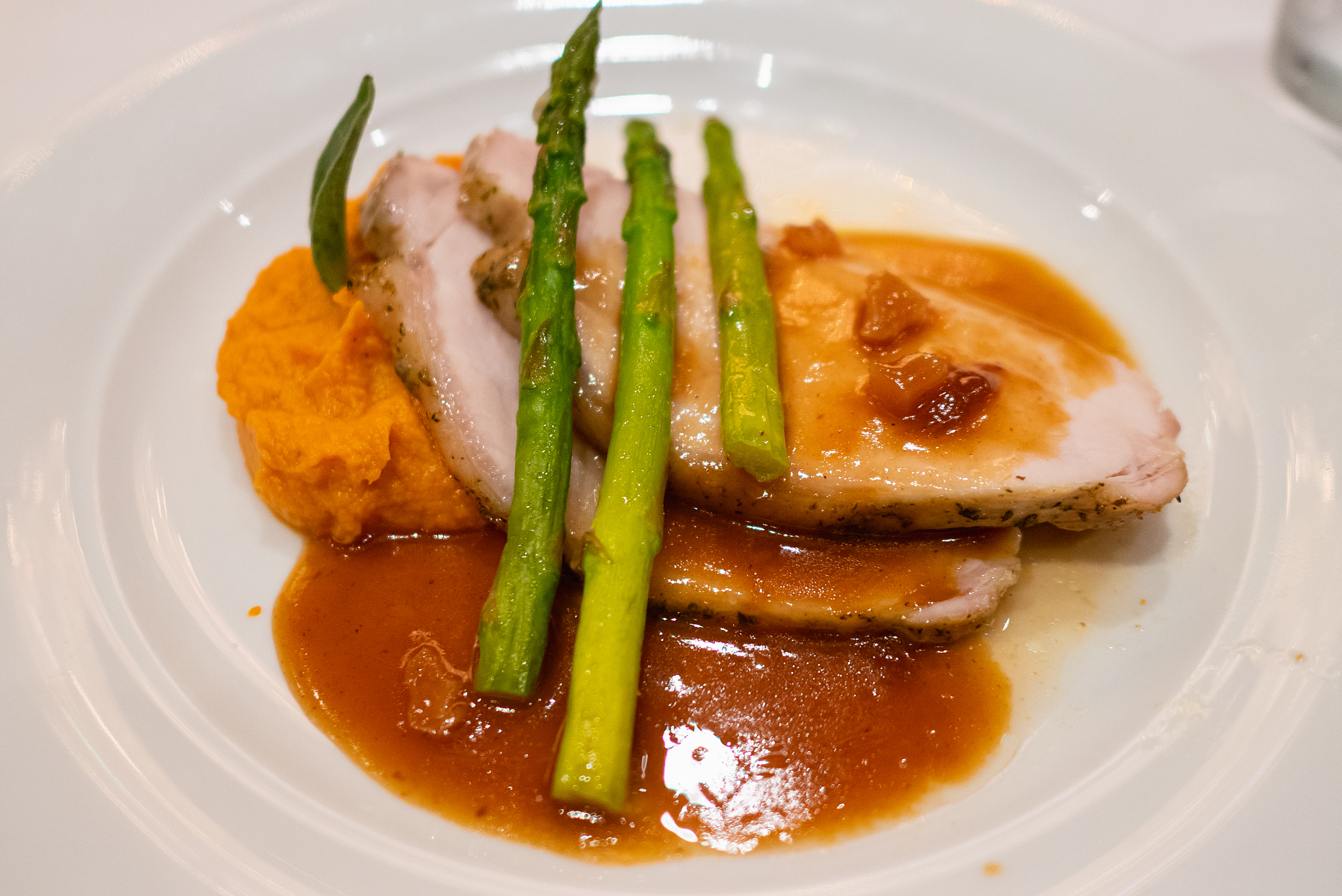 roasted pork with asparagus, mash potato and sauce