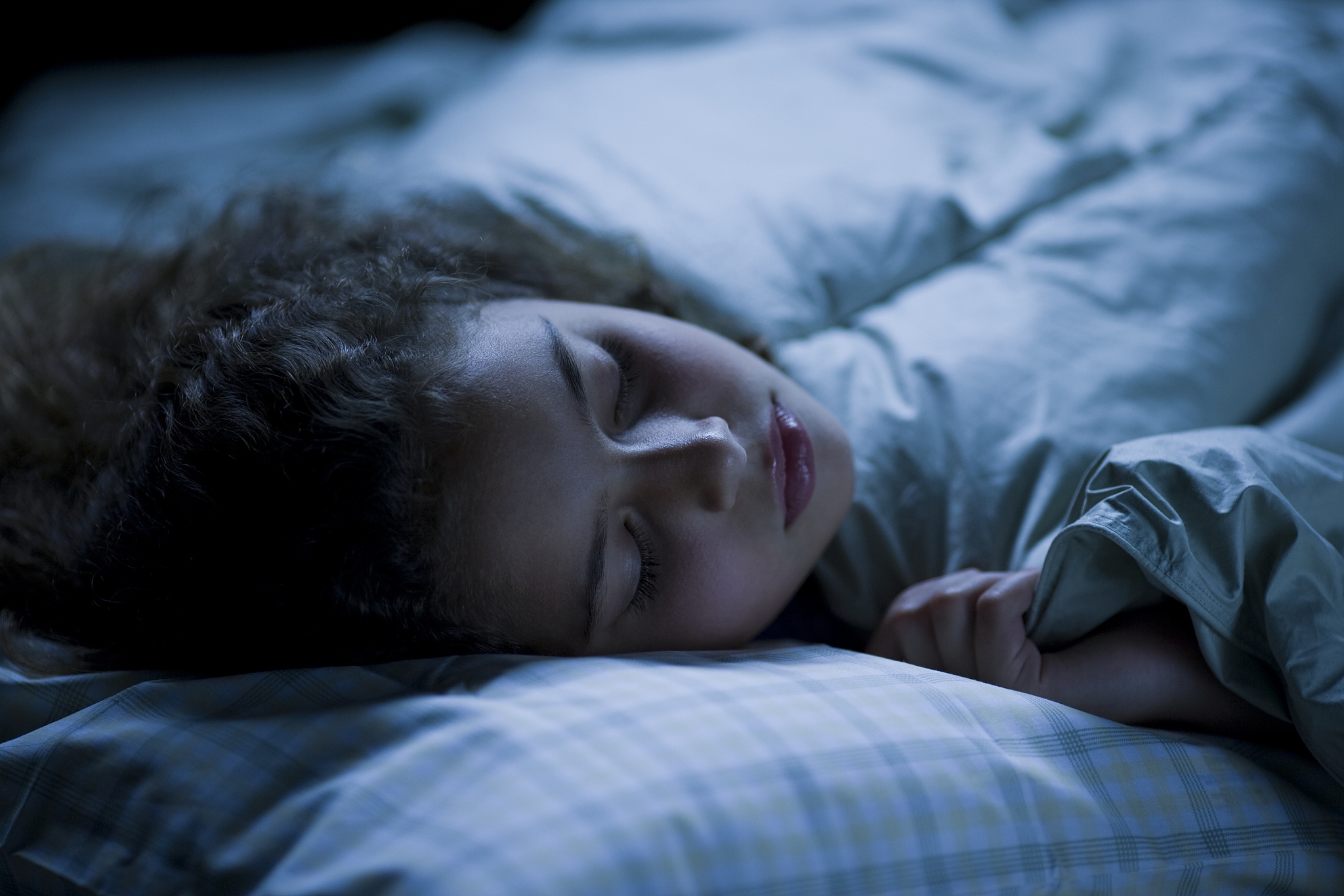 girl sleeping in bed