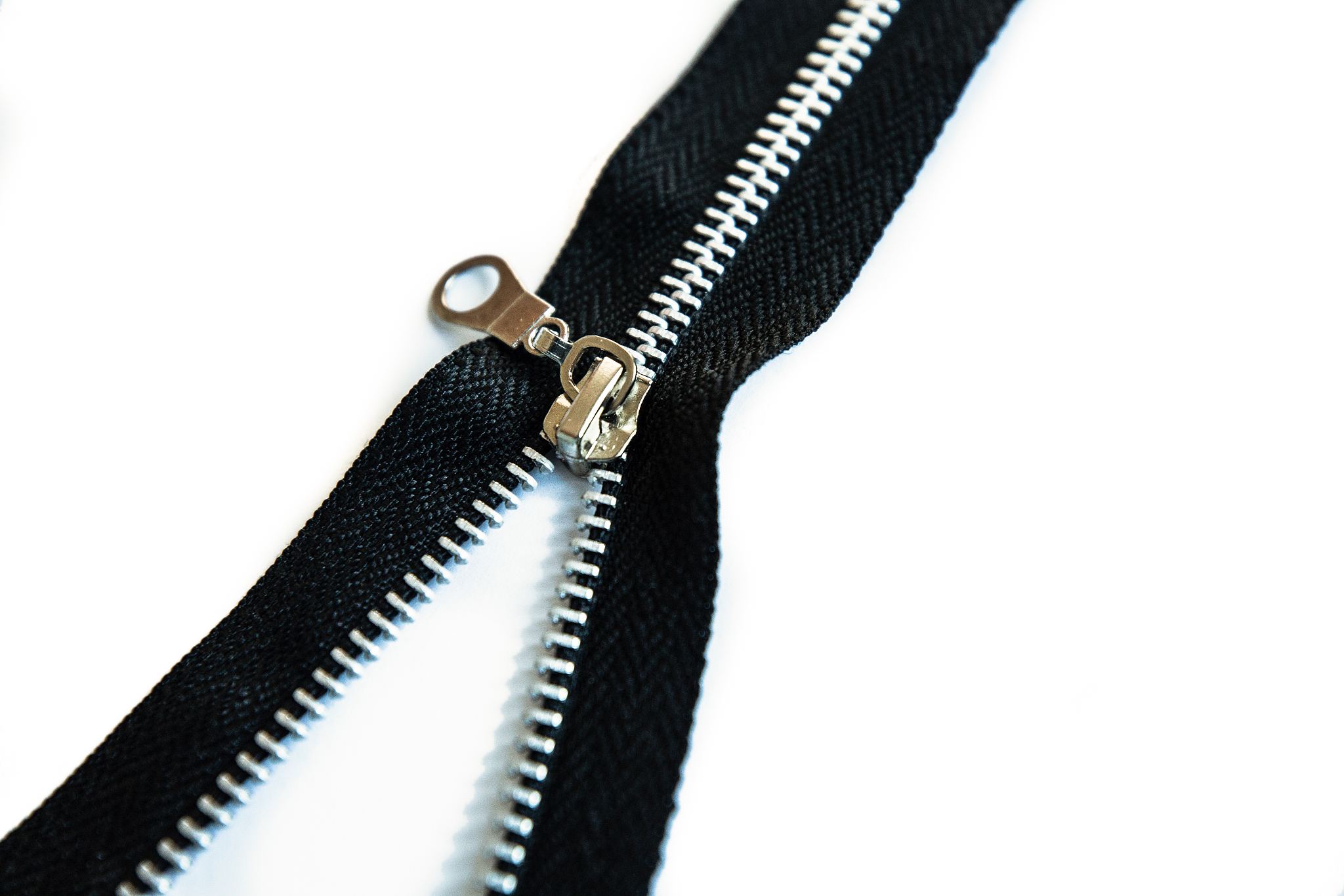 one open zipper isolated on white background