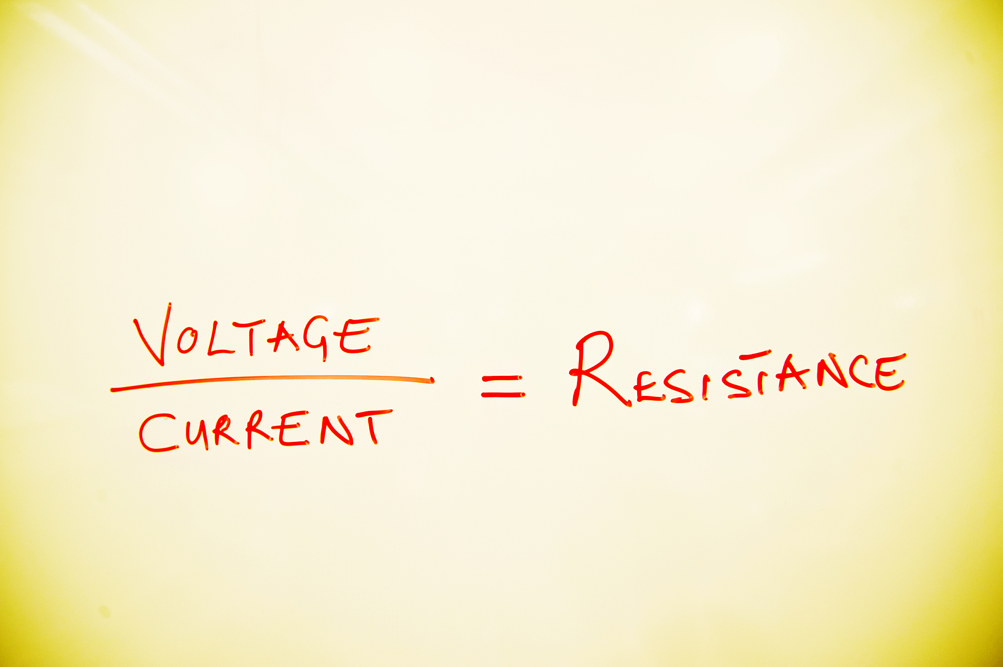 laws of physics: ohm's law (v=ir) on a white board