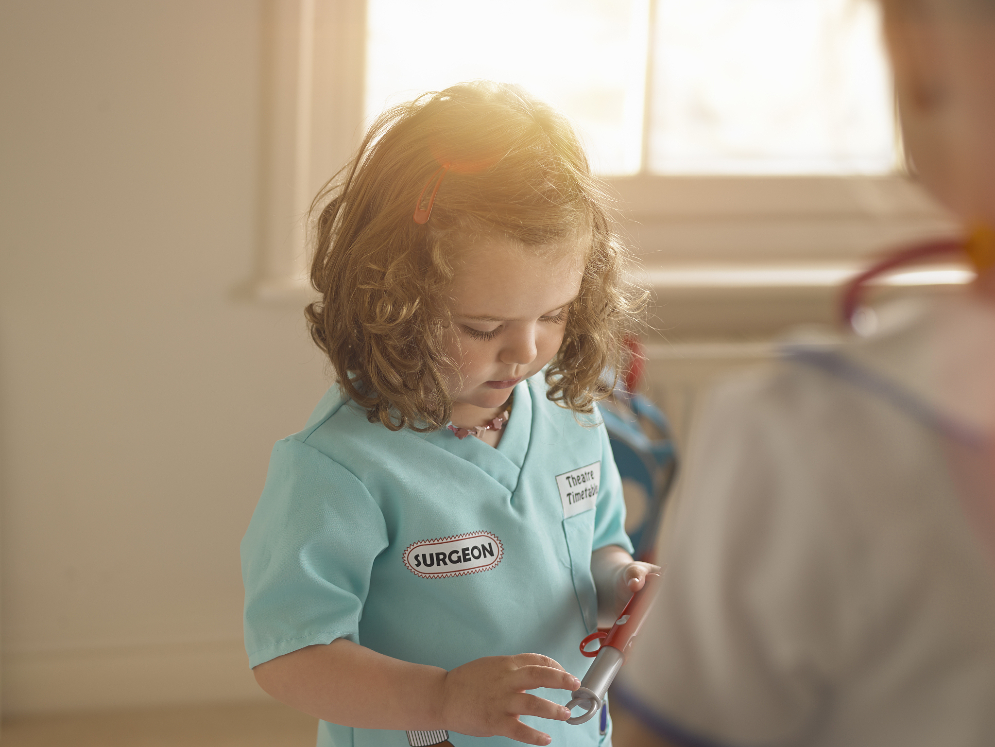 young girl dressed as doctor