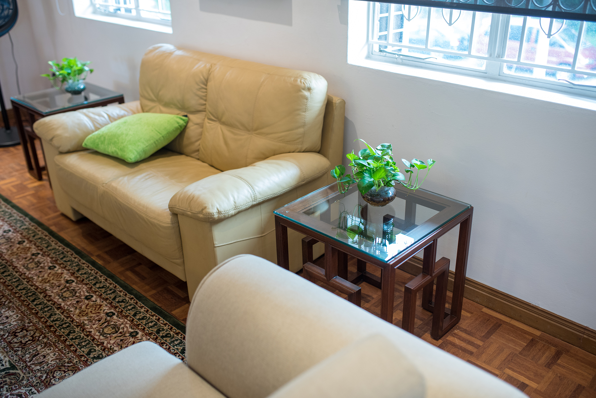 asian living room with big comfortable leather couch and wooden 