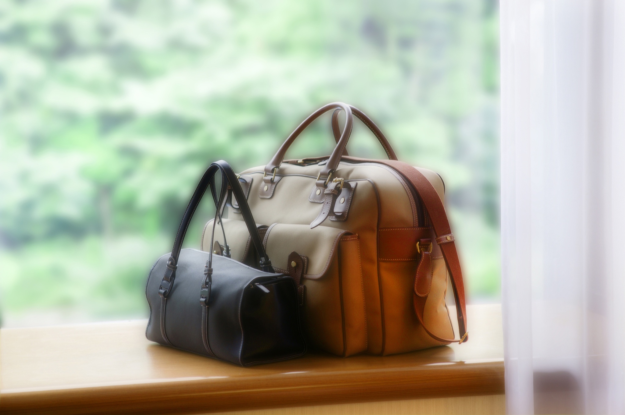 baggage beside window