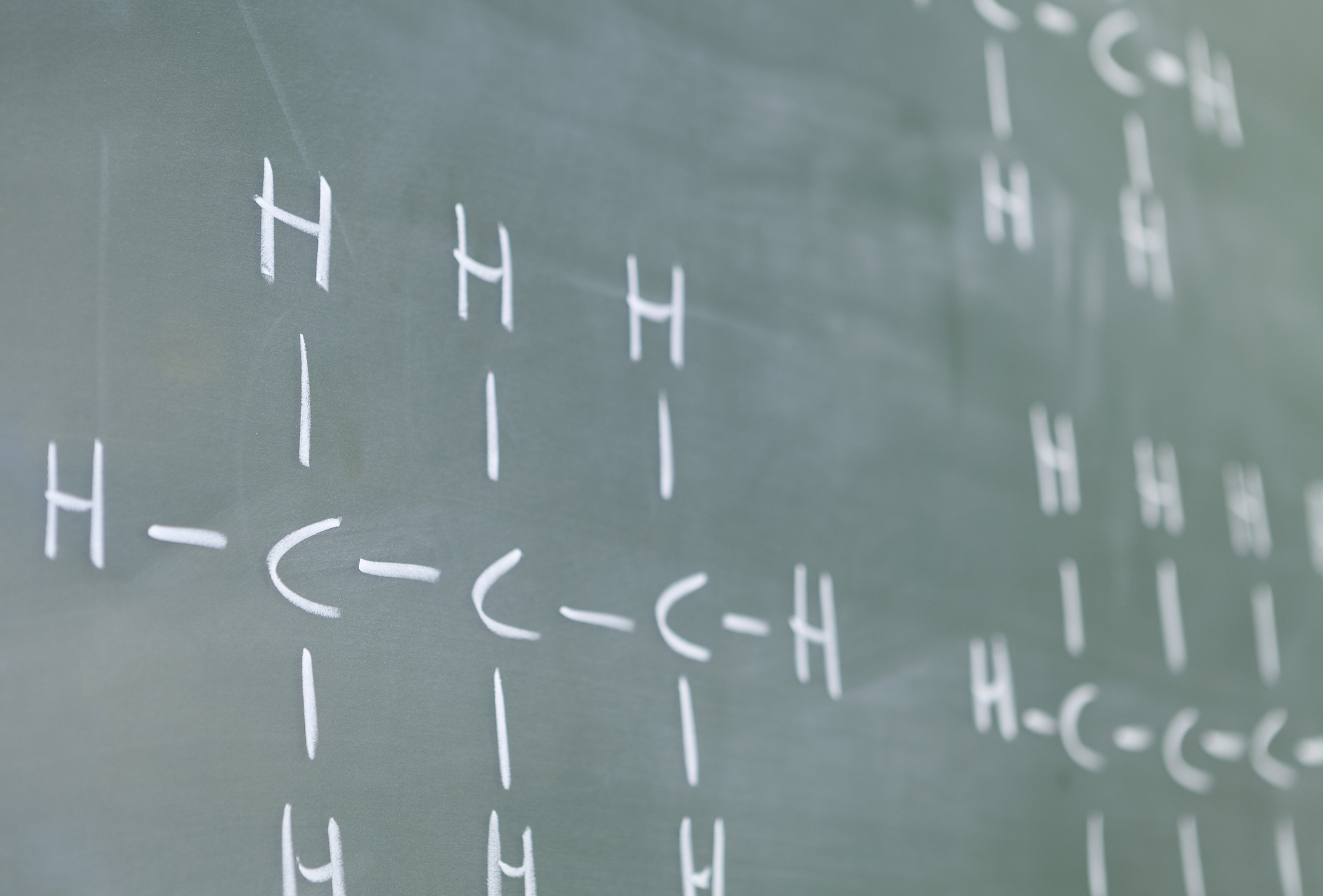 chemical assignment on a chalkboard