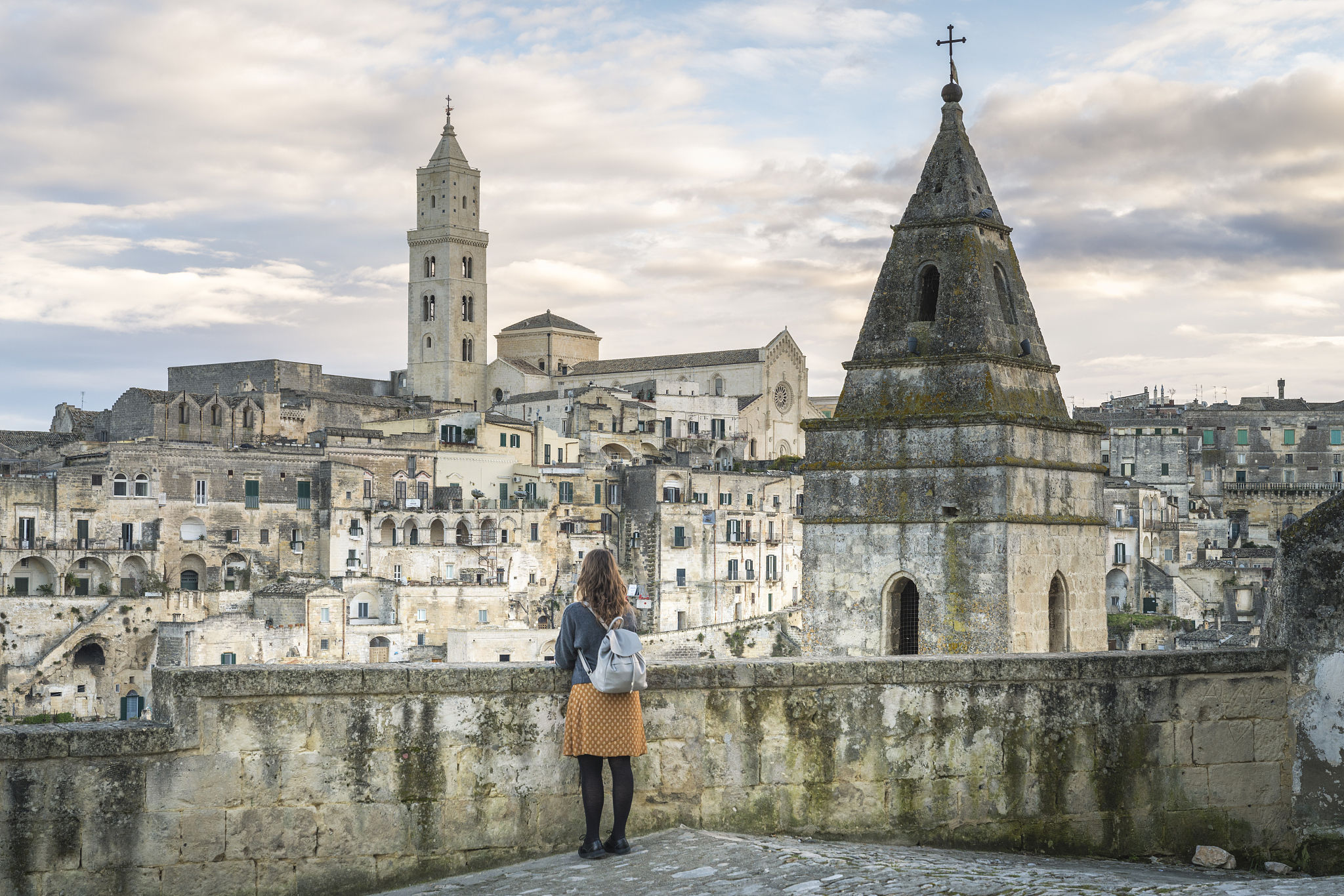 woman visiting matera.