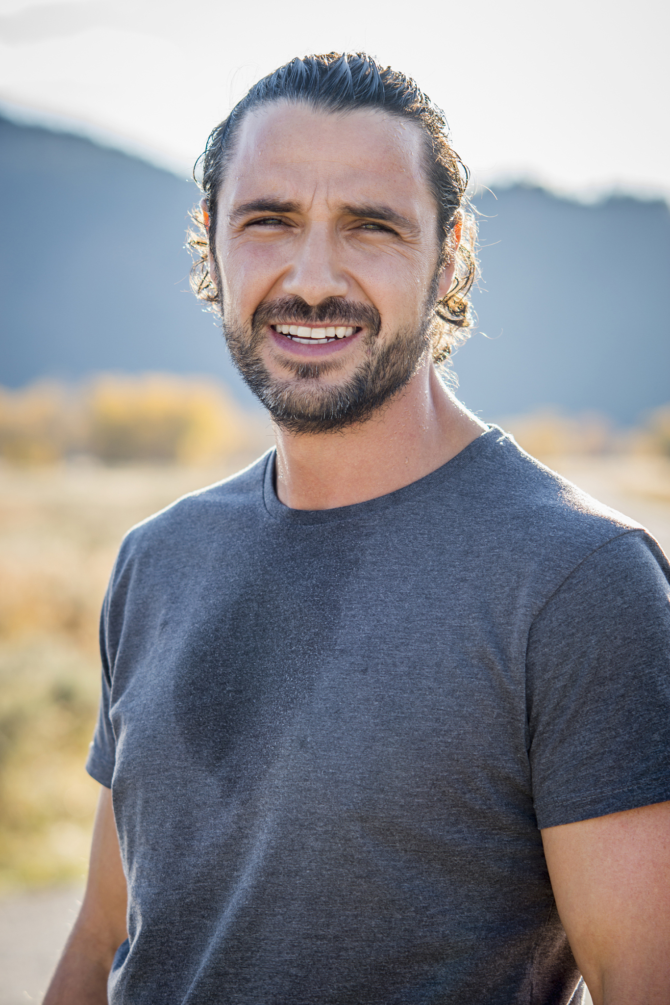 smiling hispanic man sweating