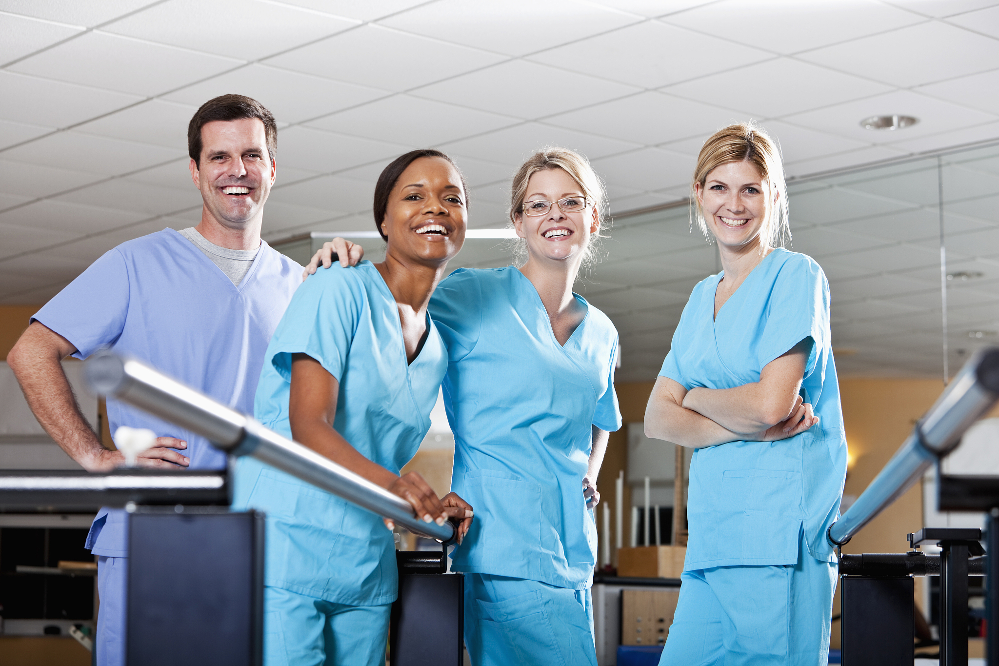 physical therapists in rehabilitation room