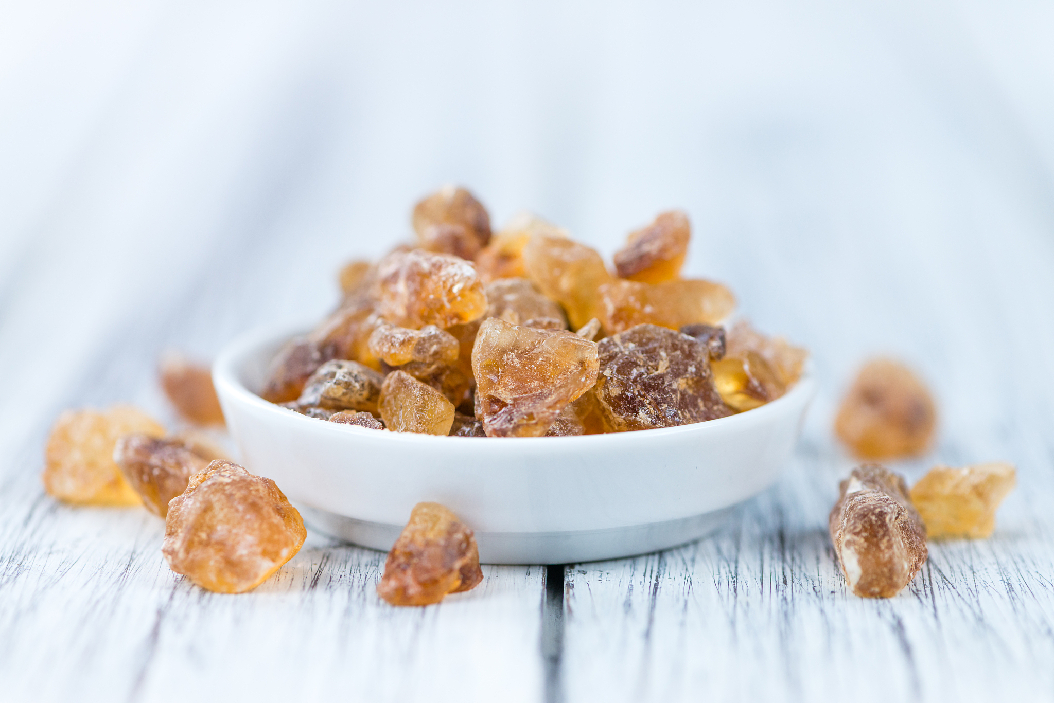 wooden table with brown rock candy