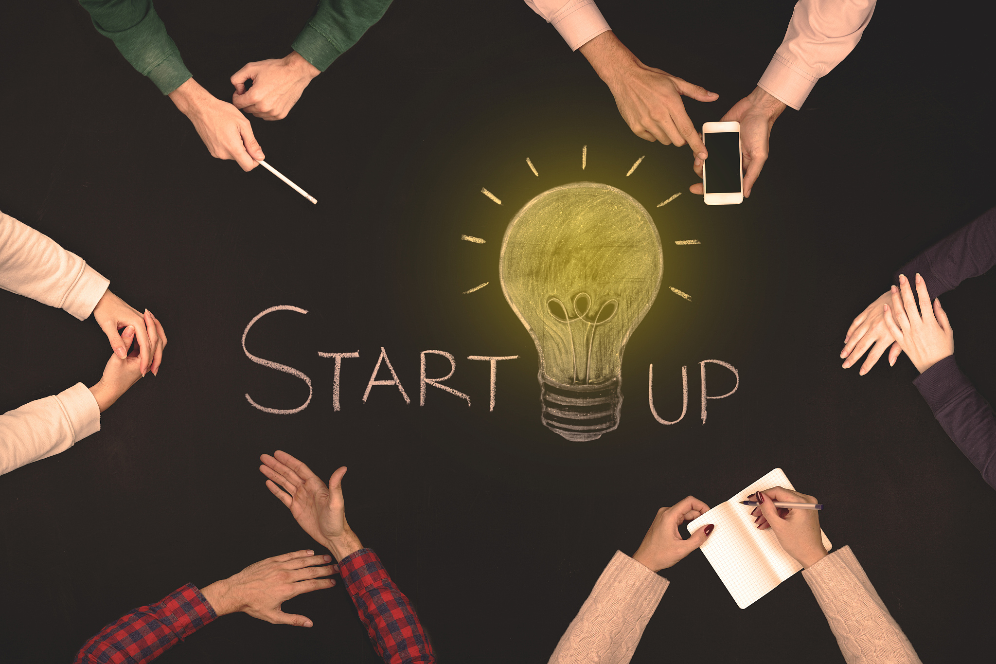 teamwork startup concept - top view of six people.