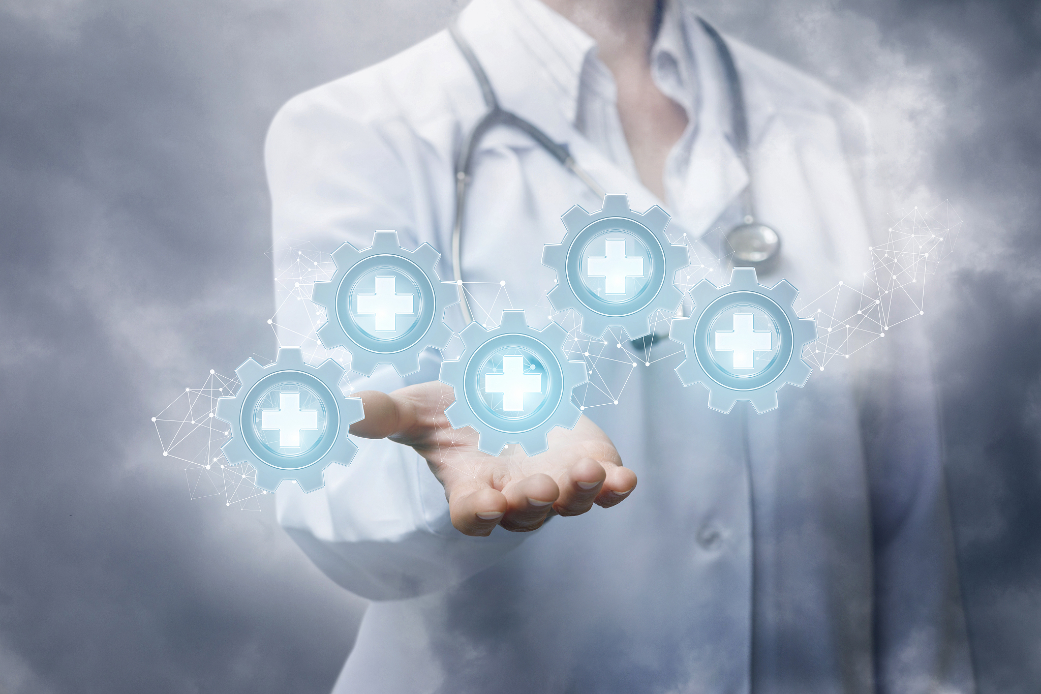 doctor showing medical equipment group icons.