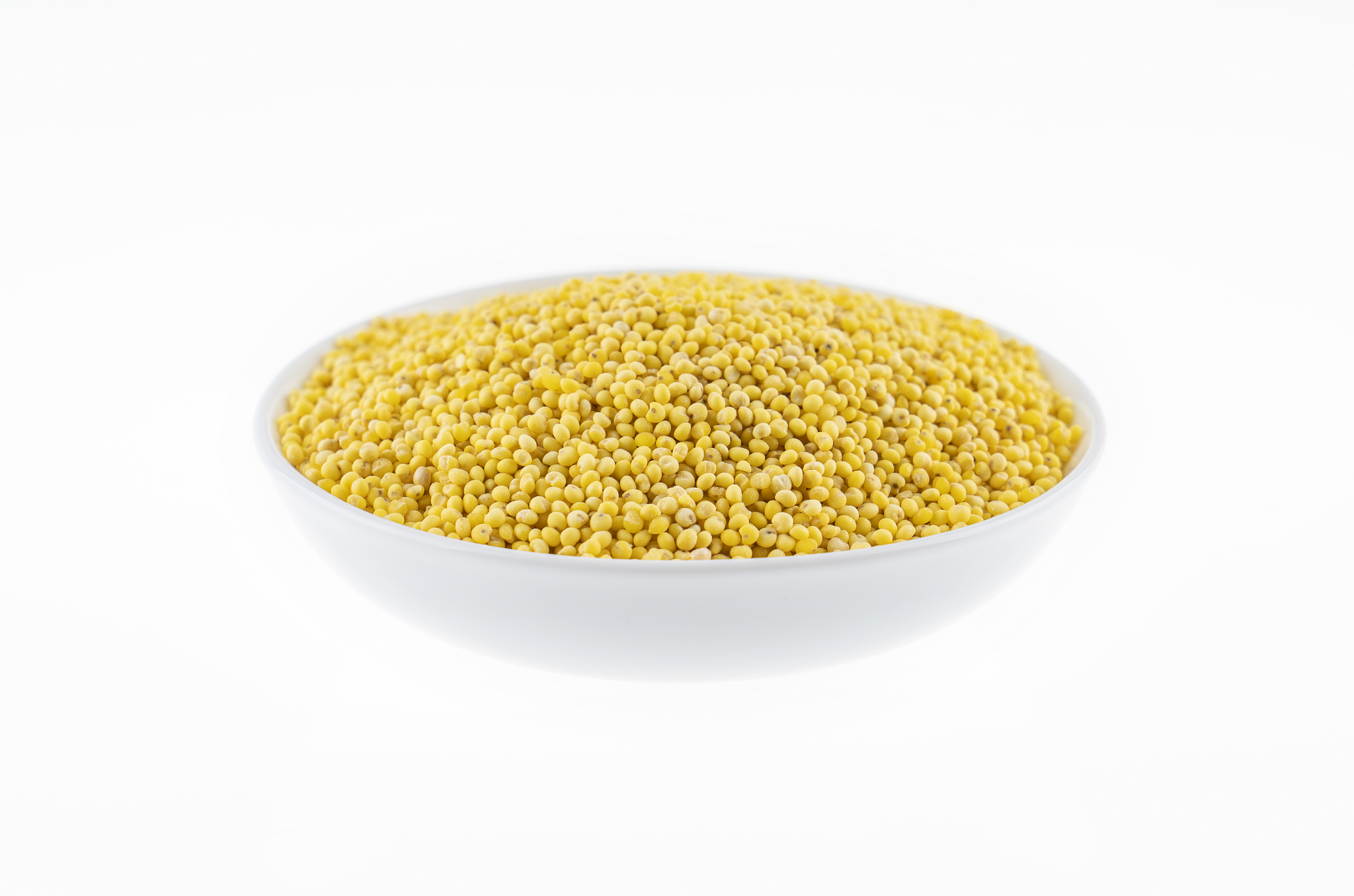 dry millet isolated on white