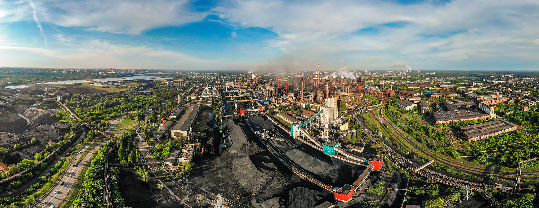 industrial zone landscape aerial view with smoke from metallurgi