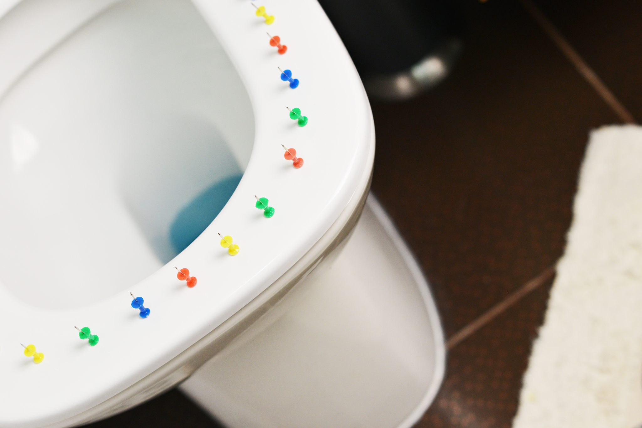 conceptual image of a hemorrhoid disease with multi-colored thum
