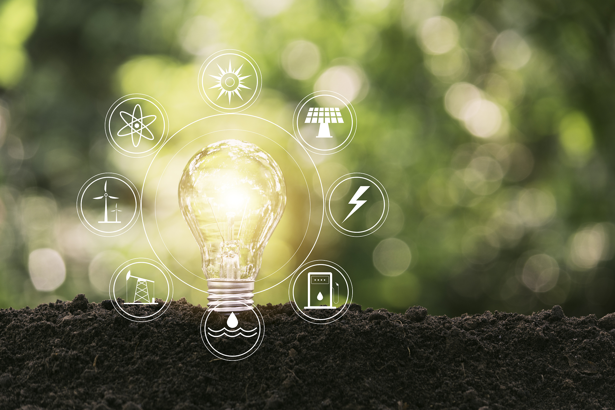 energy saving light bulb on nature background for energy and cre