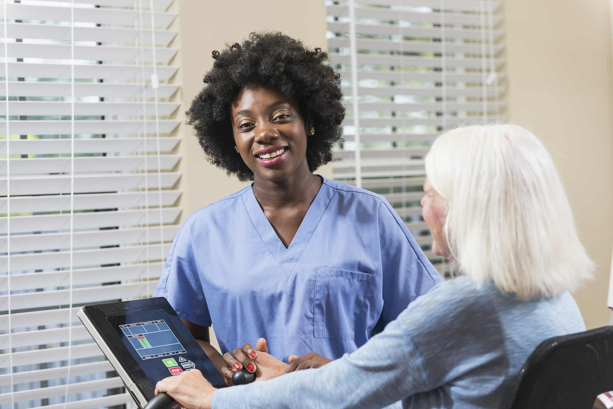 physical therapist working with a female patient