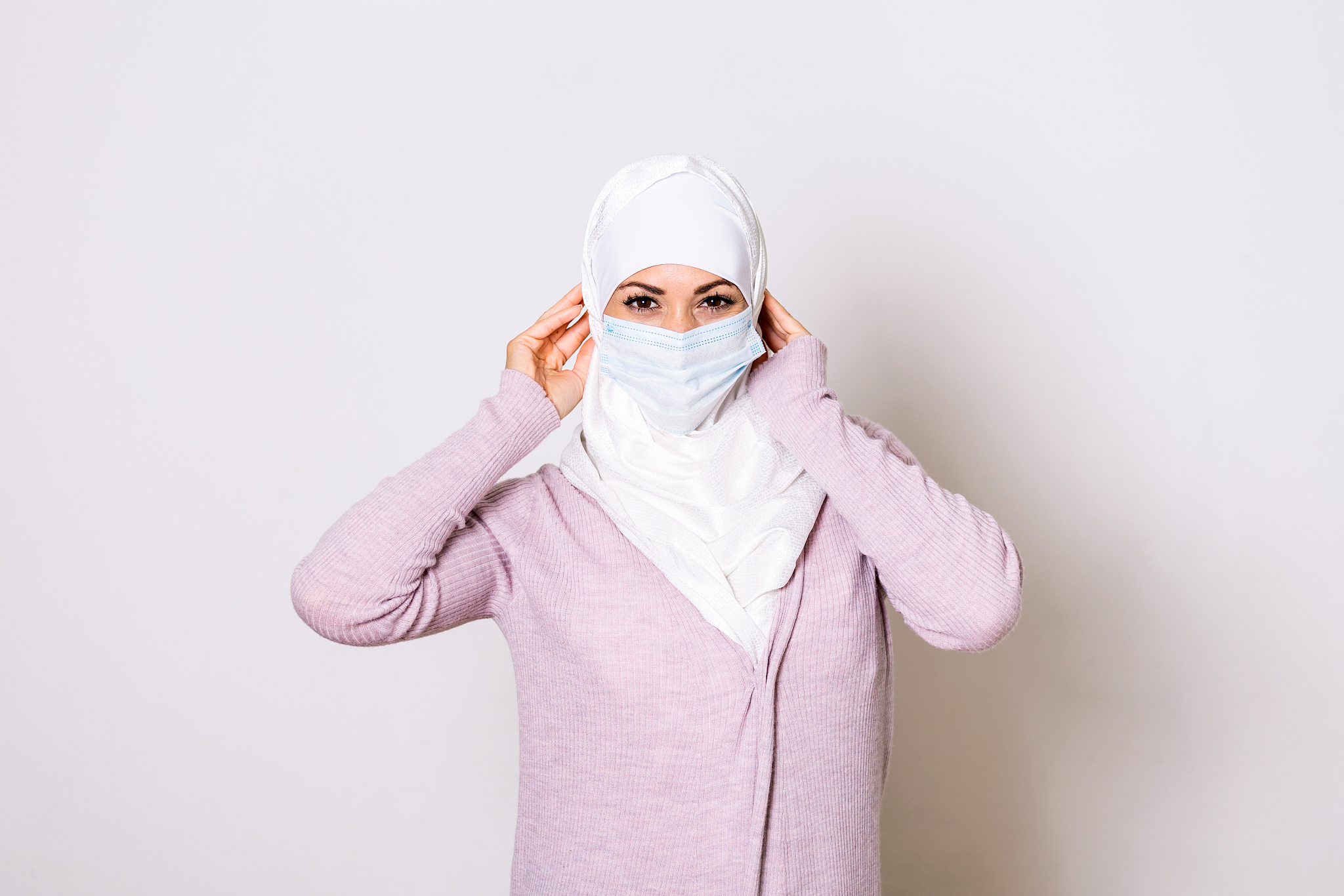 muslim woman with mask to protect her from corona virus. corona 