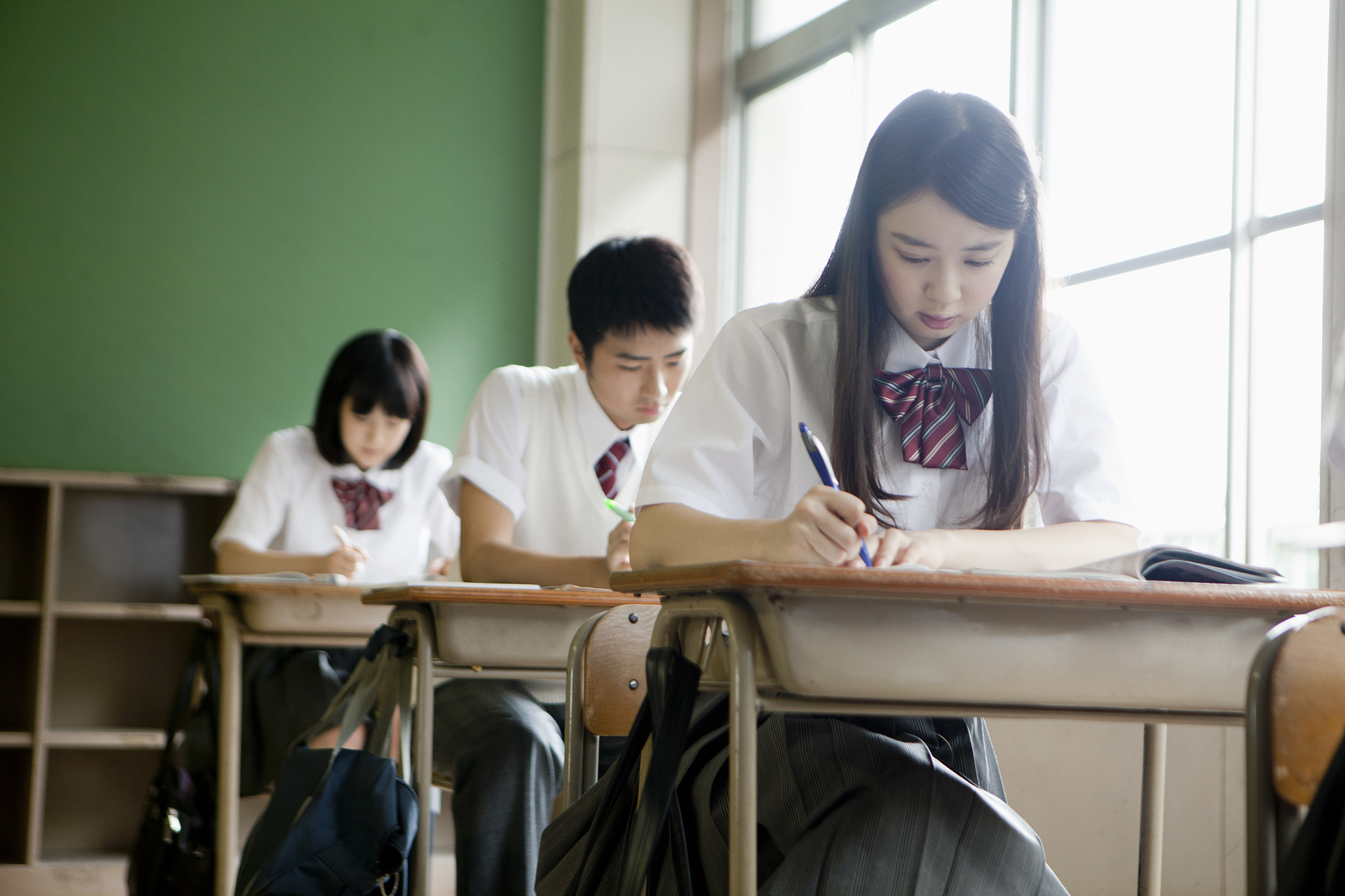 3 students in the classroom