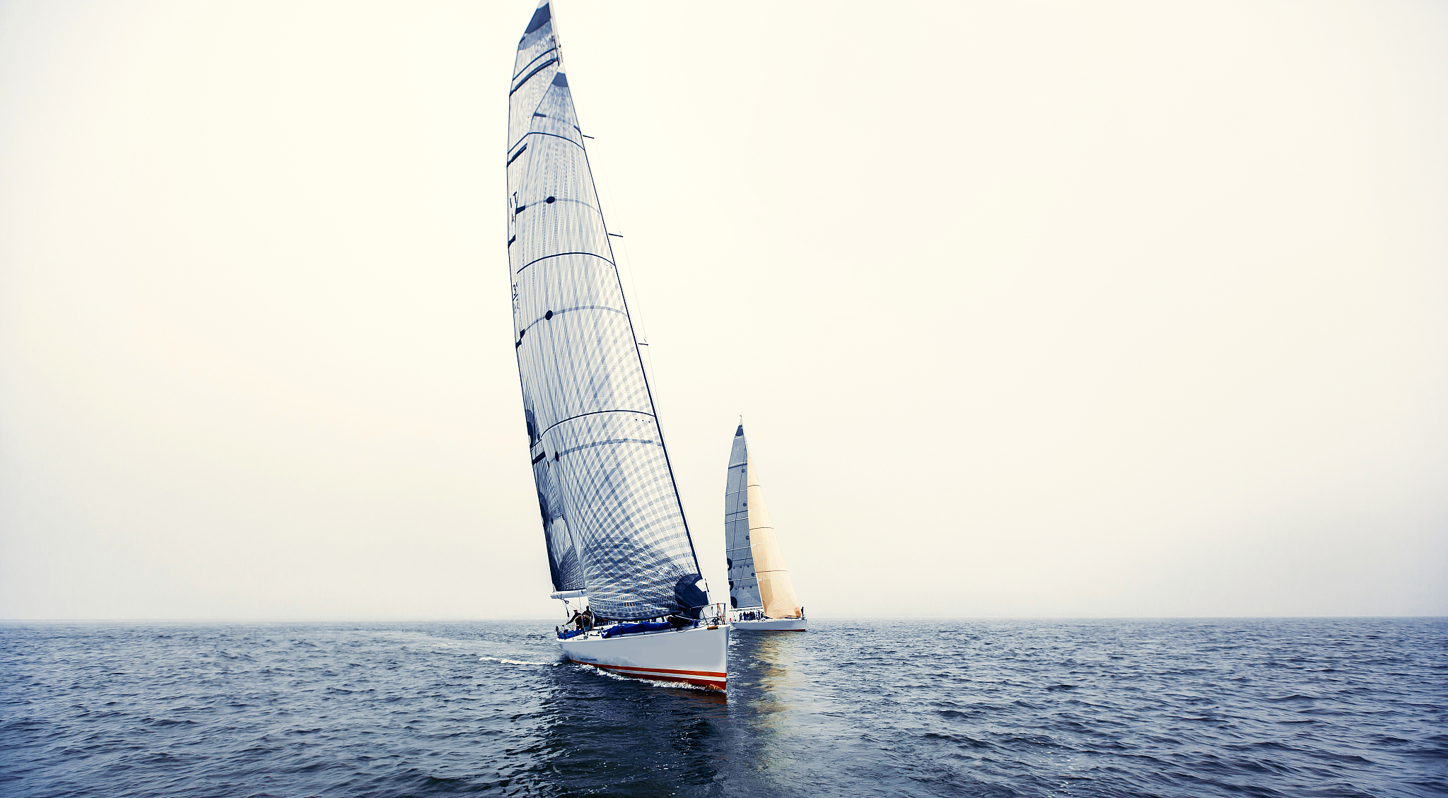 sailing ship yachts with white sails