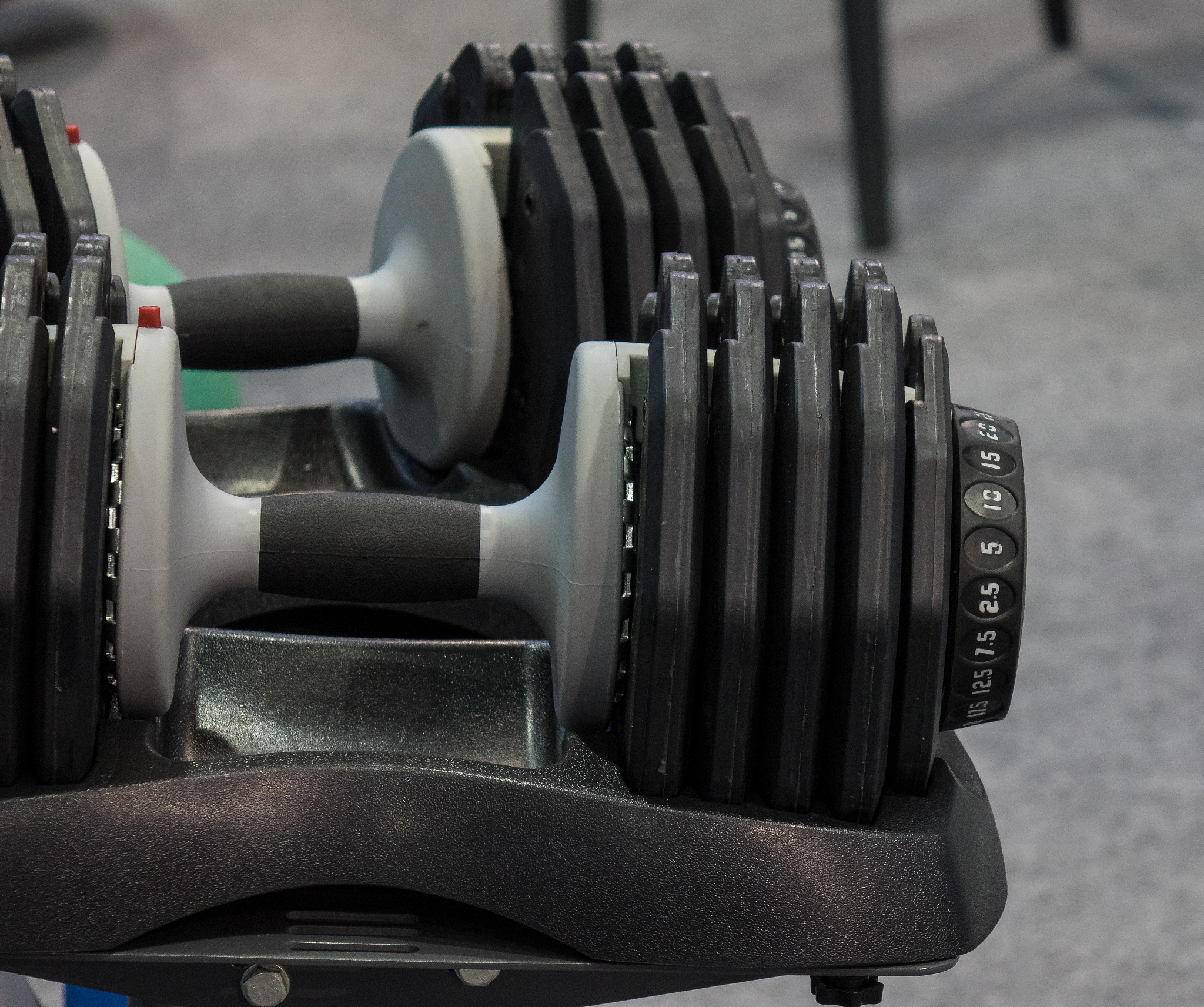 the dumbbells  in a fitness center