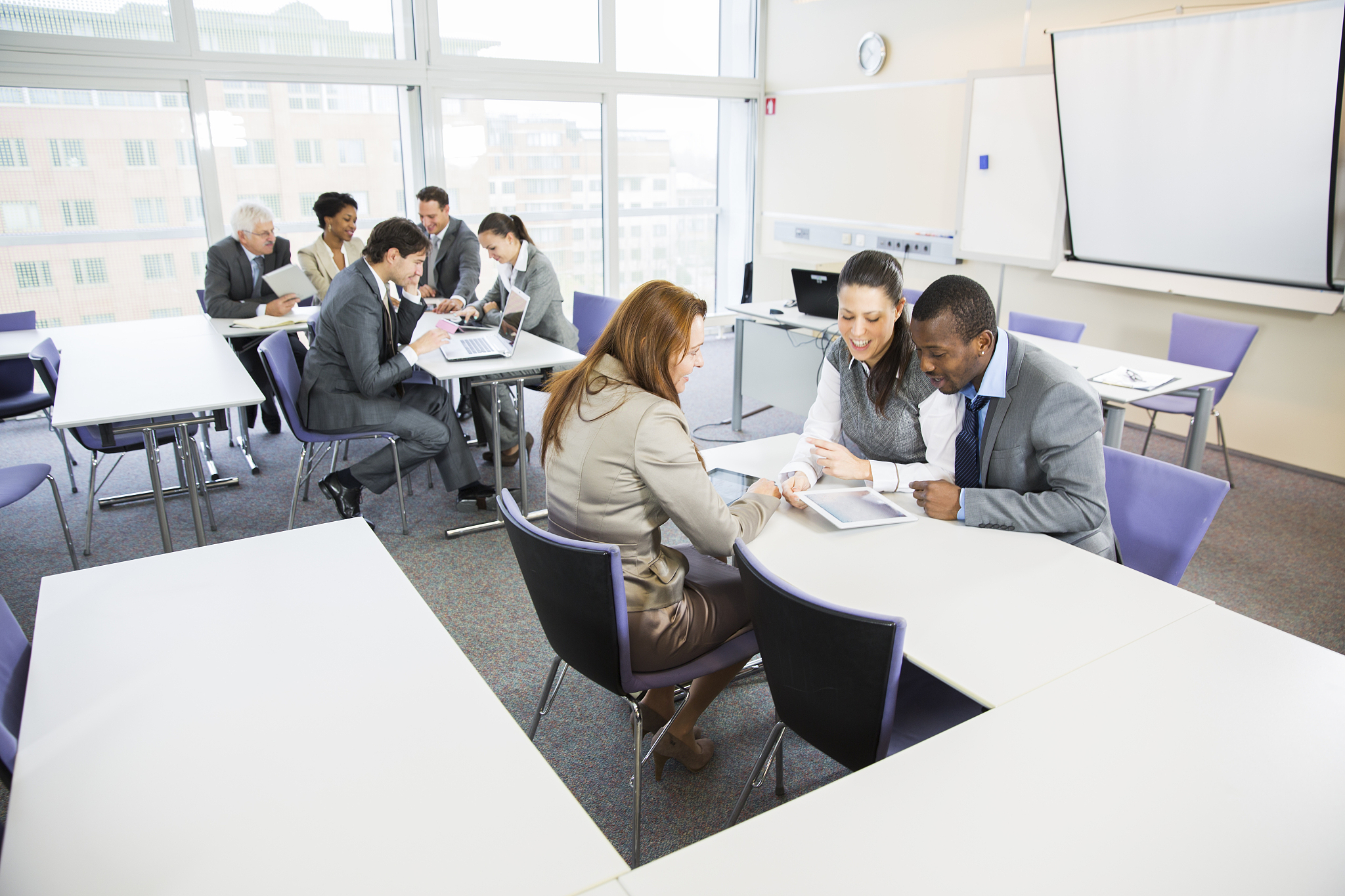 business people in education room talking about their problems