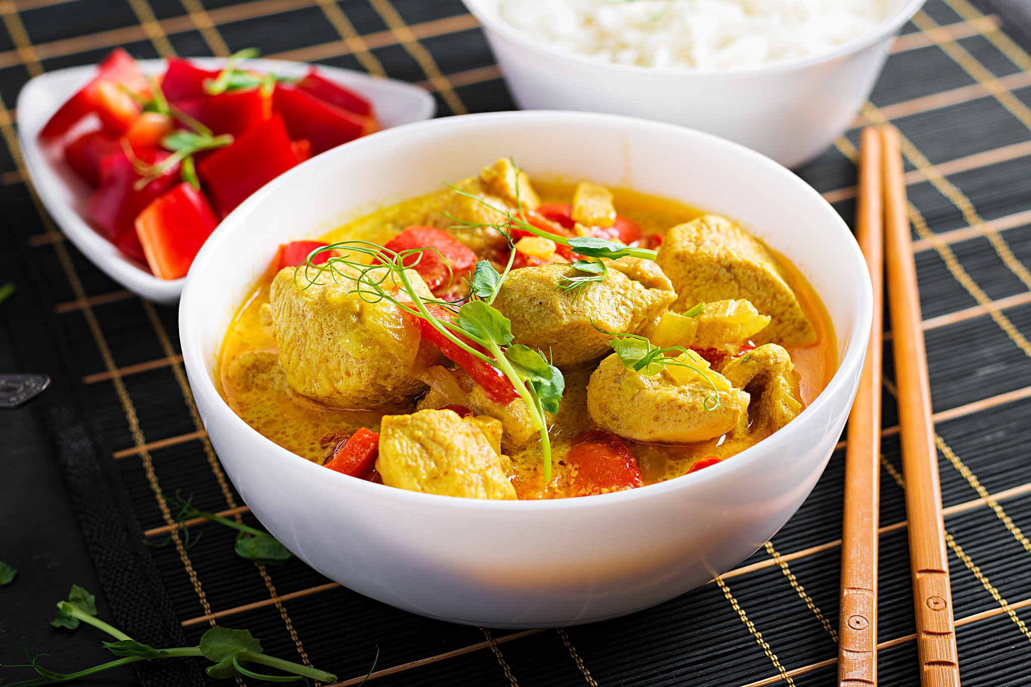 indian chicken curry with basmati rice in bowl. traditional indi