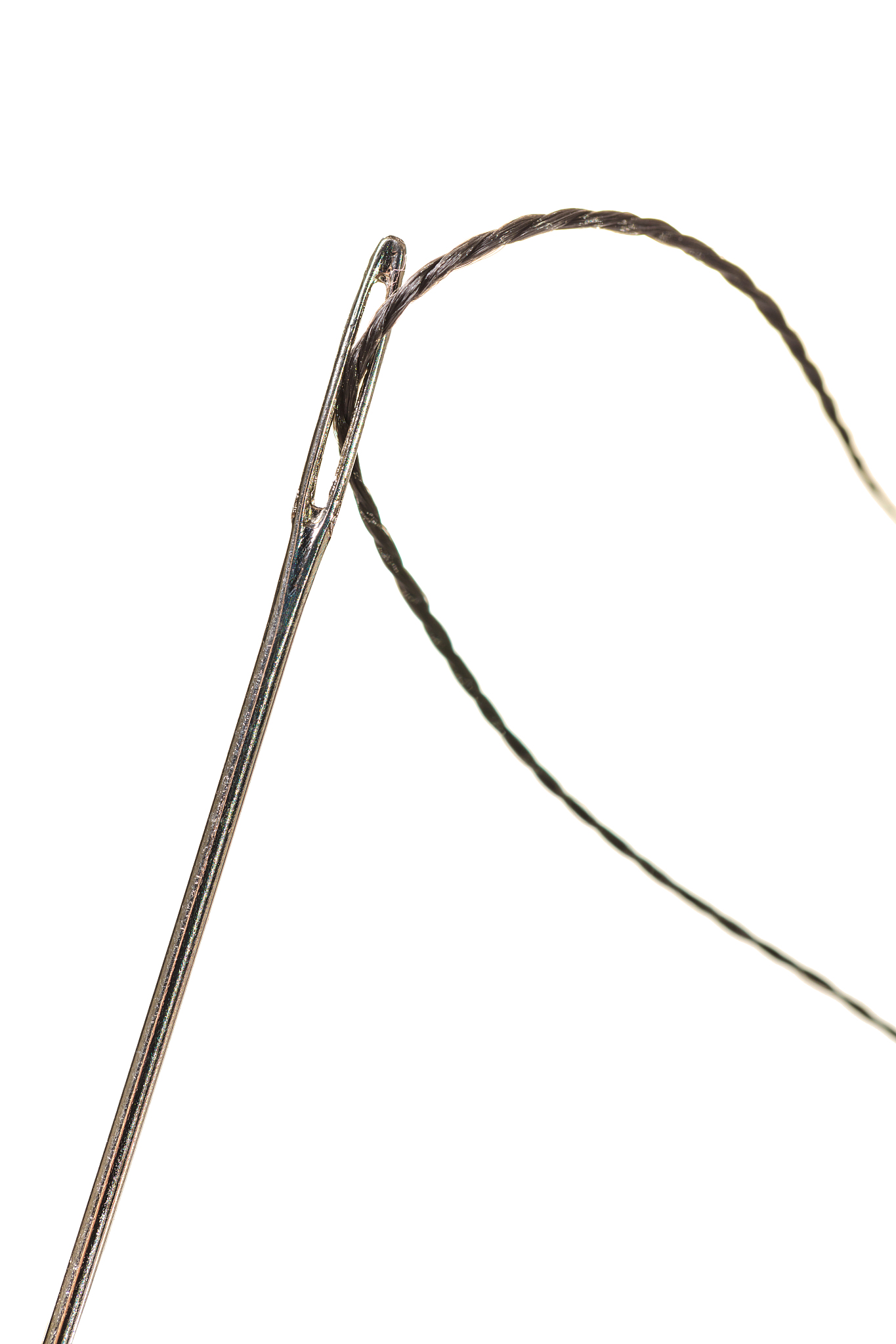 black thread in a needle