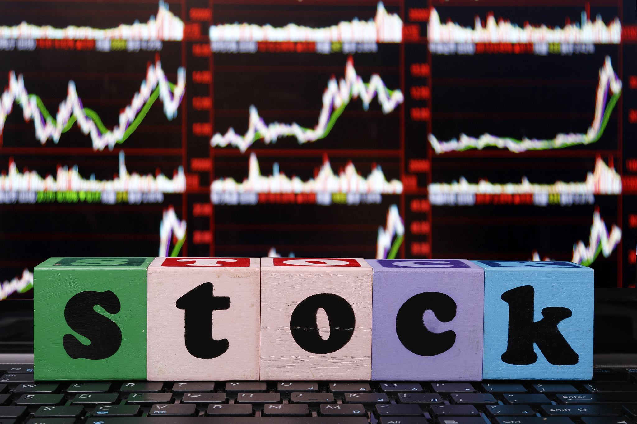 wooden puzzles over market index illustration