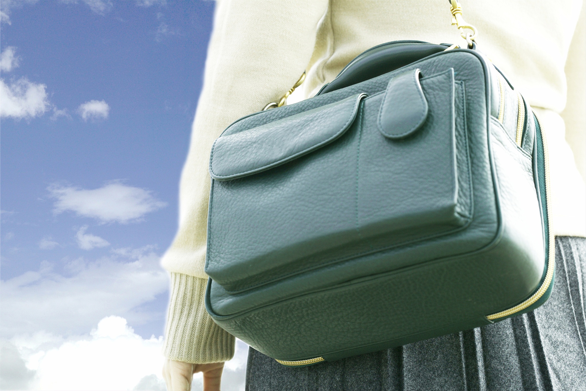 woman s rear view, with shoulder bag