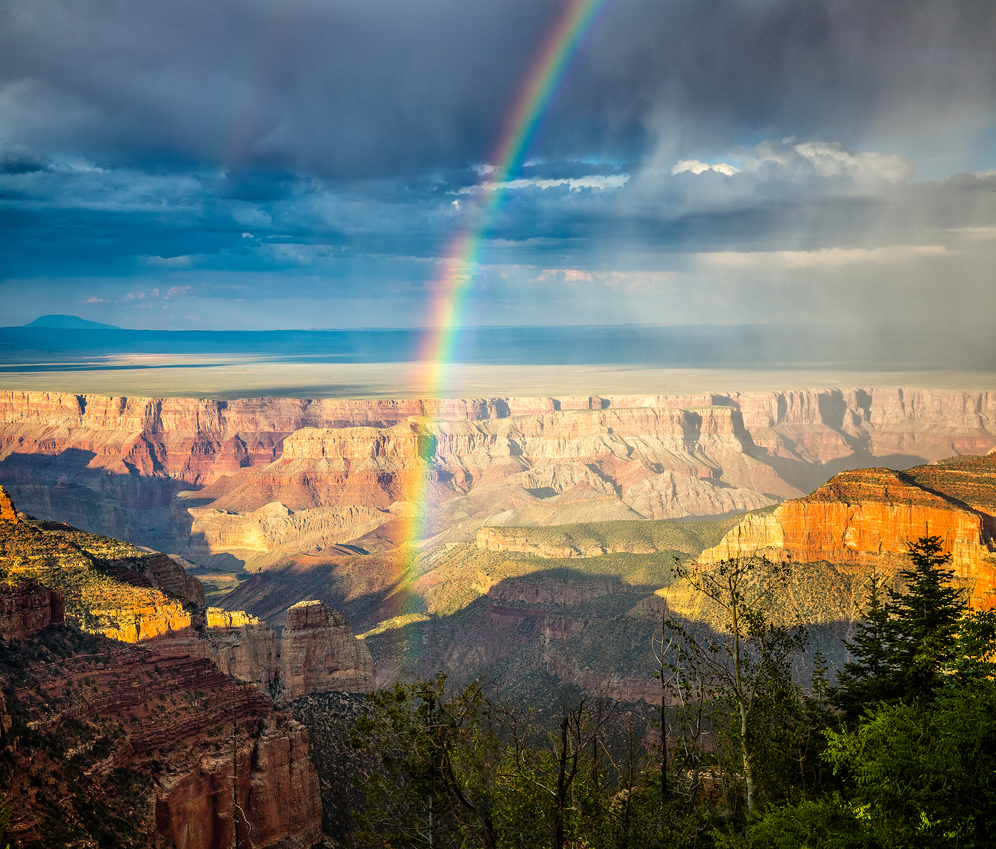 rainbow over the grand canyon seen from vista encantada on the n