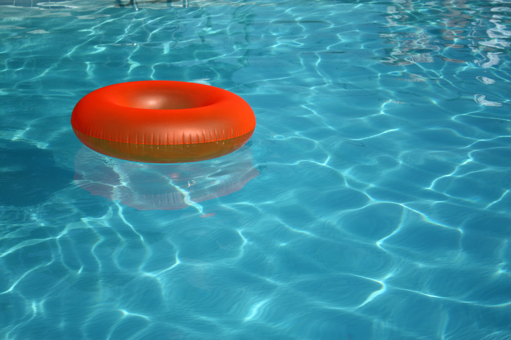 floating in the pool