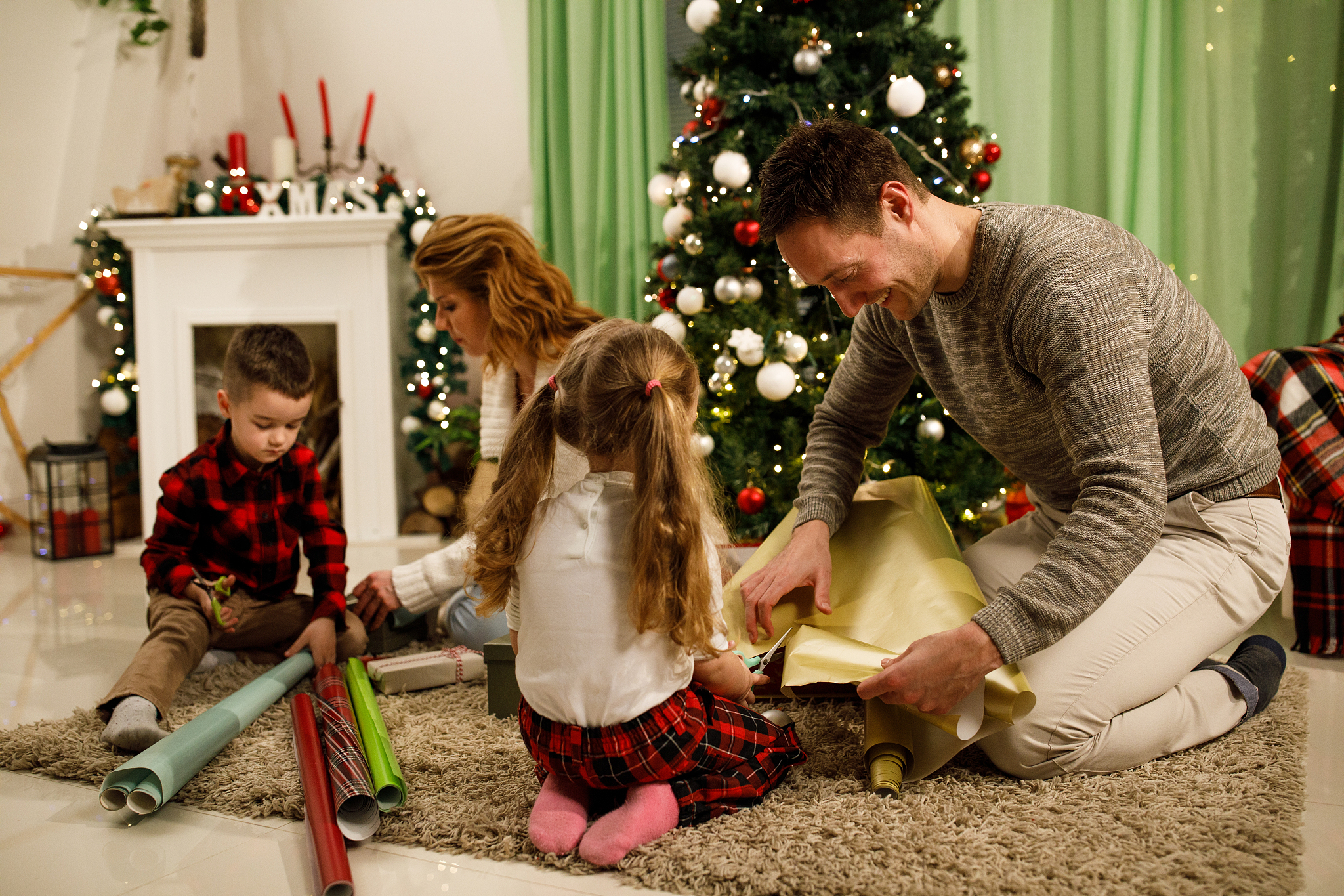 family enjoying christmas holidays together at home